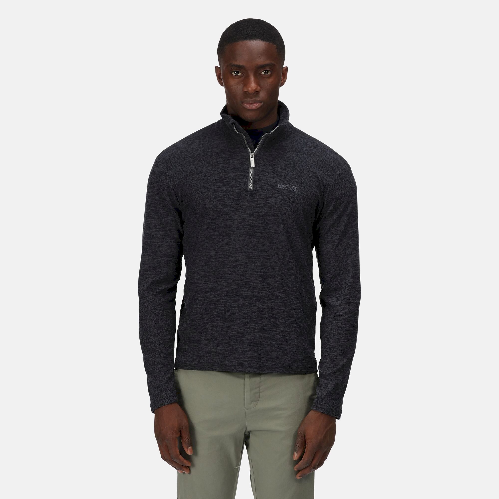 Material: 96% Polyester, 4% Elastane. Lightweight fleece pullover with a subtle herringbone pattern and zip neck. Breeze blocking stand collar. Regatta outdoors badge on the left sleeve.