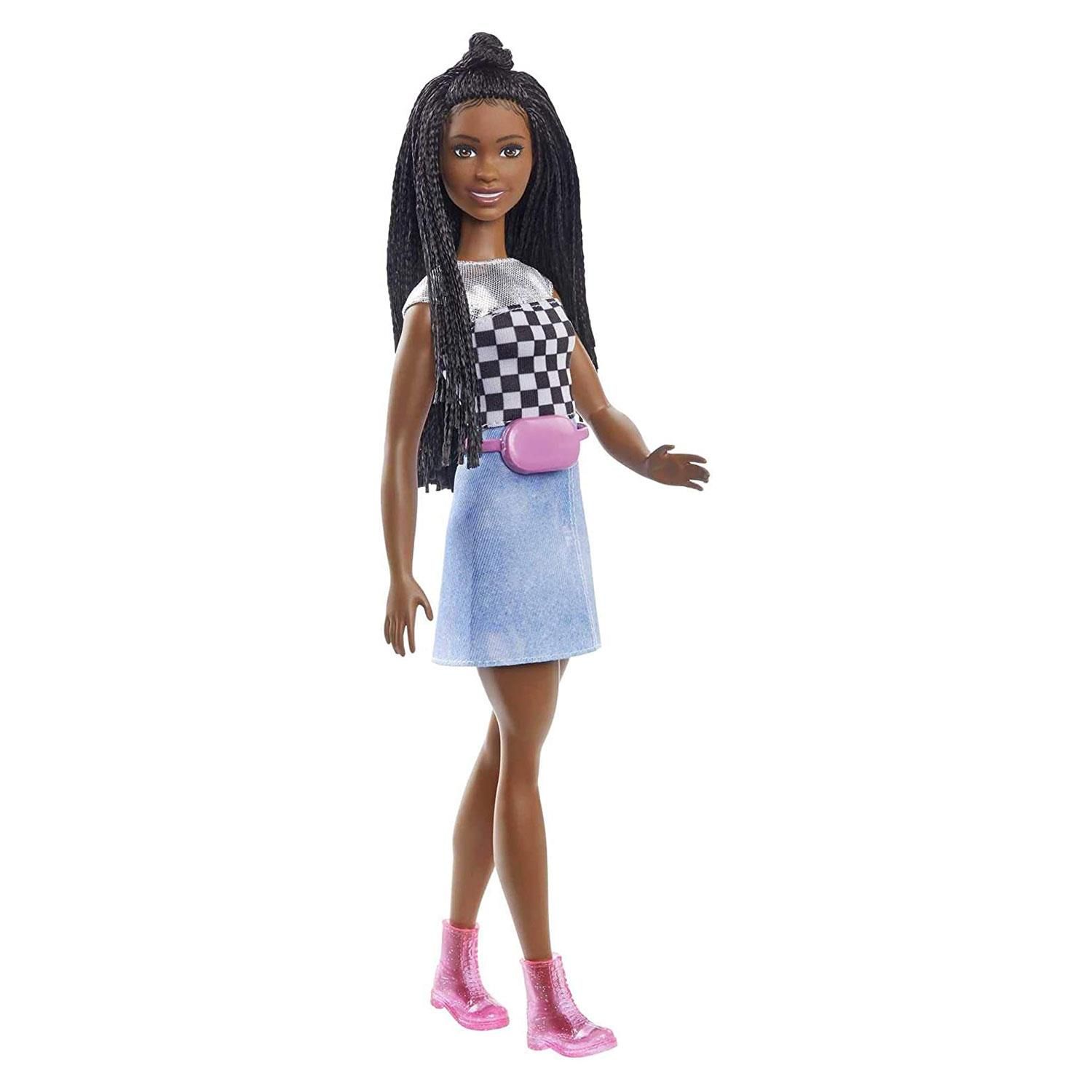Imaginations can play out adventures under the city lights or the spotlight with dolls inspired by Barbie, Big City, Big Dreams! Sporting her signature onscreen style, Barbie 'Brooklyn' Roberts doll wears a vinyl skirt and a paneled top with silvery shimmer and checkered print. Her long, braided hair is styled in a trendy top bun with baby hair, and pink boots and a matching waist bag complete her stylish look. Kids ages 3 years old and up will love recreating favorite moments or dreaming up their own big adventures with dolls and playsets inspired by Barbie: Big City, Big Dreams! Each is sold separately, subject to availability. Doll cannot stand alone. Colors and decorations may vary.

Join Barbie and her friends on their biggest adventure yet with dolls inspired by Barbie: Big City, Big Dreams!
Barbie 'Brooklyn' Roberts doll comes dressed in a vinyl skirt and paneled t-shirt with silvery shimmer and checkered print.
Casual pink boots are perfect for exploring the city, and a matching waist bag completes her stylish look.
Her long, braided hair is styled in a trendy top bun accented with baby hairs.
With a Barbie doll in her signature outfit, 3 to 7-year-olds can imagine all kinds of stories under the city lights or the spotlight!


Brand: Barbie
Age range: 3+ Years
Part Number: GXT04
Material: Plastic

Package Includes: Barbie Big City Big Dream Brooklyn Doll & Accessories
