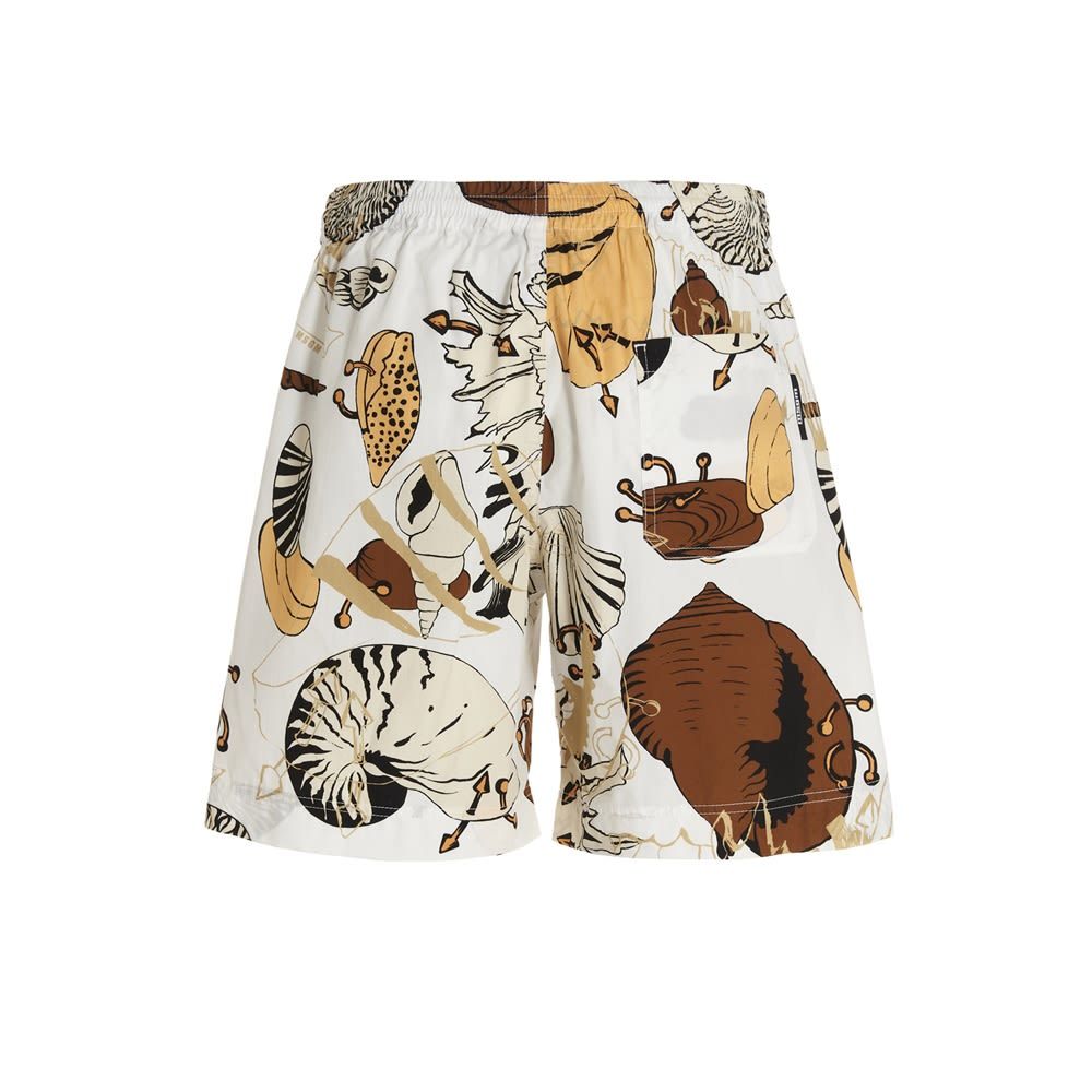 'Sea shell' cotton bermuda shorts featuring an all over print and an elastic waistband.