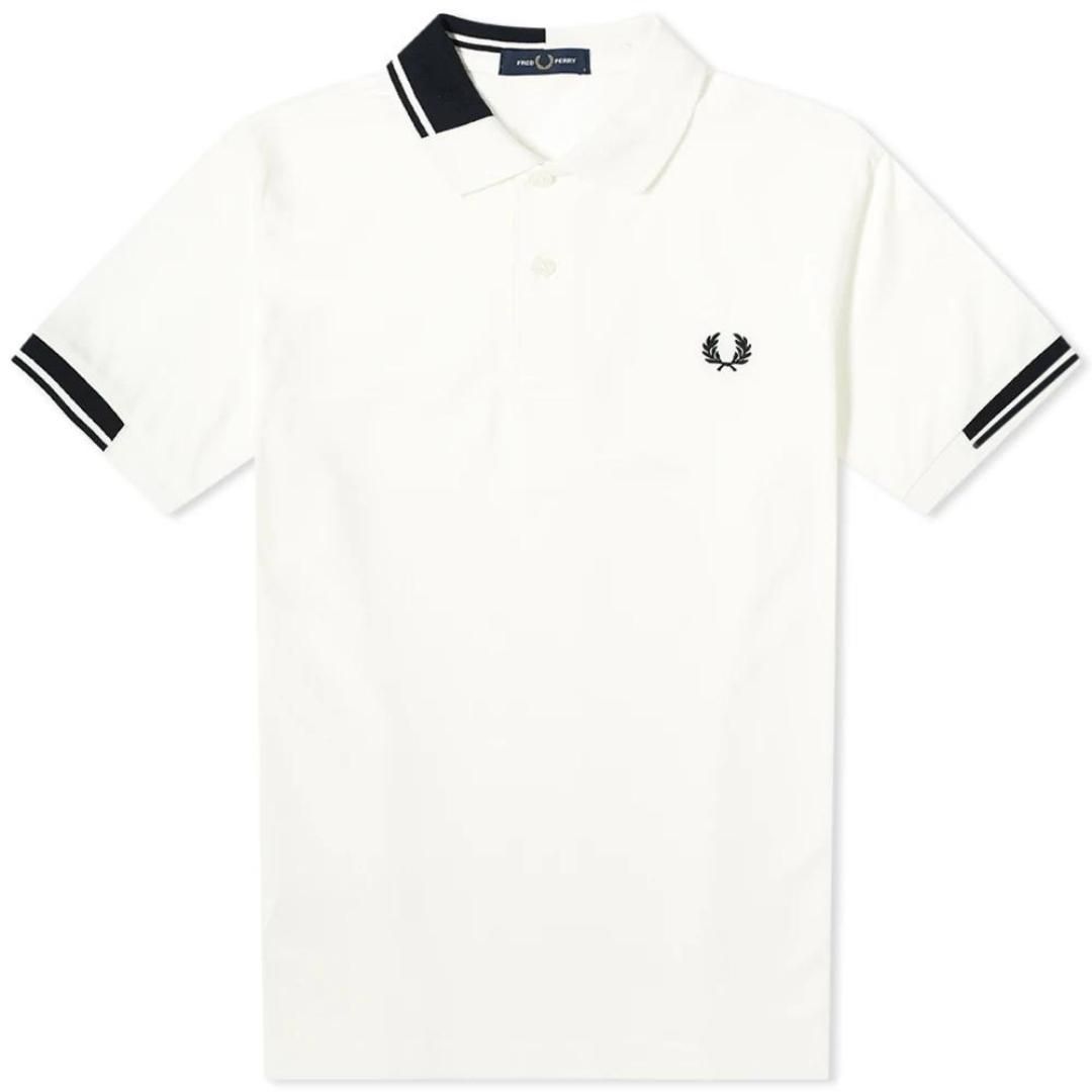 Fred Perry Abstract Collar M8648 129 White Polo Shirt. Fred Perry White Polo Shirt. Pattern On Collar. Button Closure At The Neck. Style: M8648 129. 100% Cotton
