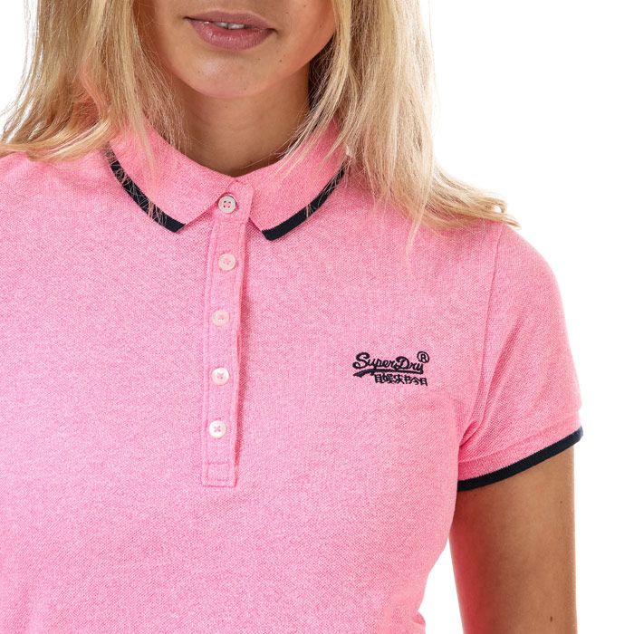 Superdry women’s Pacific Polo. This athletics-inspired polo features a coloured embroidery of the Superdry logo on the chest and stripe details on the collar and sleeve hems. This is finished with a Superdry Athletics logo tab on the hem. For a key look this season, partner this polo with jeans and trainers for the perfect off-duty look.
