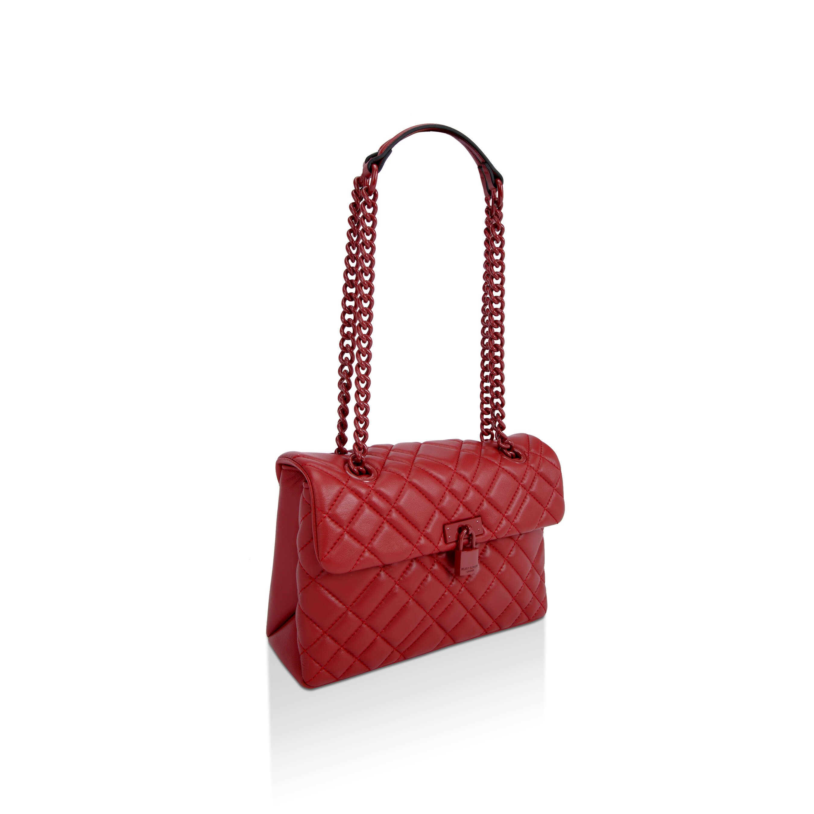 The red KGL Brixton Lock Bag is crafted from soft lambskin leather with overstitch quilting design. There is a wine coloured metal branded padlock on the front flap.