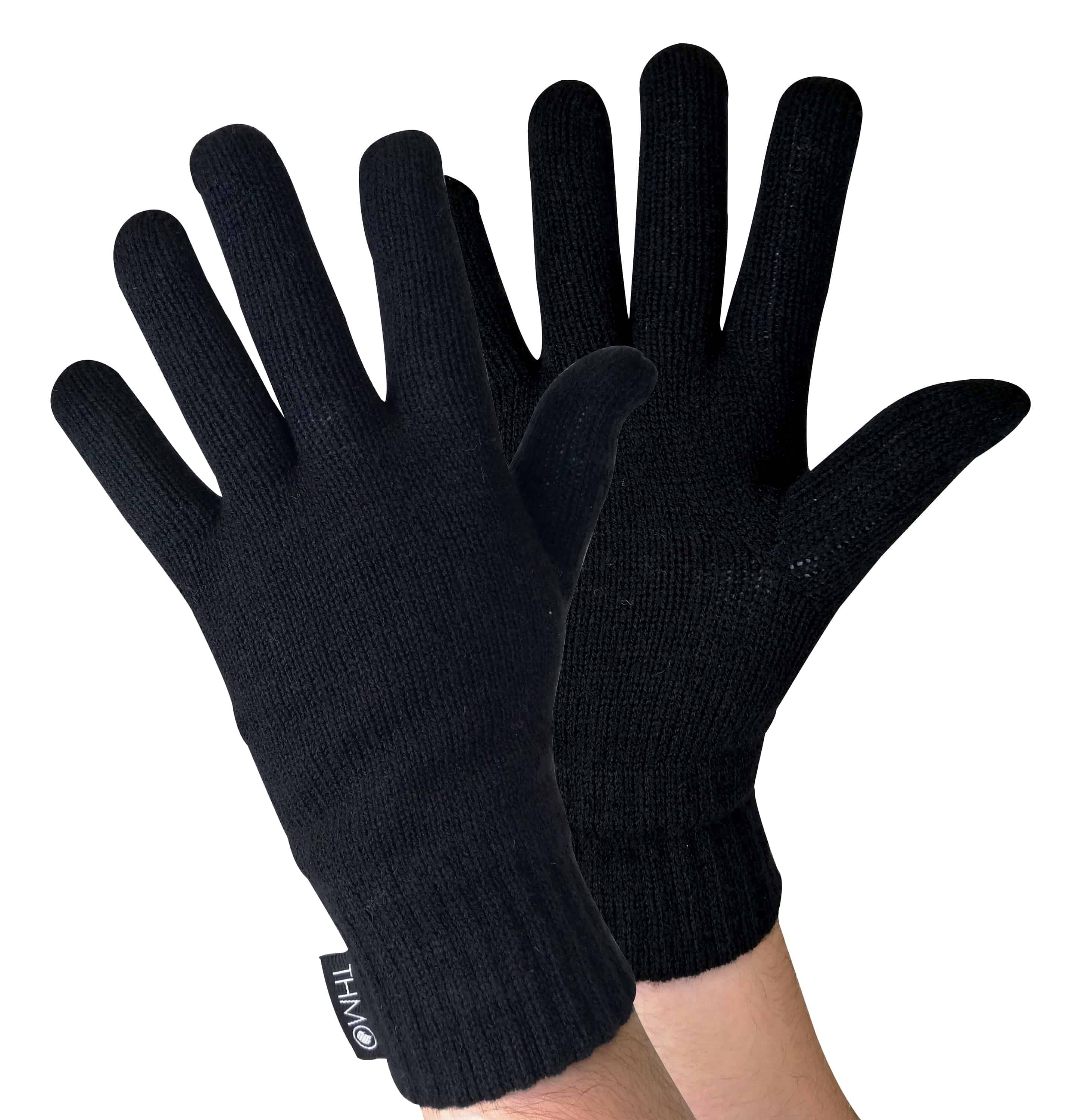 Mens THMO Full Finger Gloves  When blisteringly cold temperatures hit it is usually the end of your limbs that are hit the hardest. This obviously includes your hands. If you are looking for Gloves with expert knitting and effective lining then these mens THMO full finger Gloves with thinsulate lining are the items you need to keep your hands warm and protected.  These Gloves have two layers built into them to facilitate the process of keeping your hands warm. The outer layer is knitted made with 100% acrylic and is there to protect your hands from cold elements. The inner lining is made with 3M Thinsulate lining. Thinsulate is well known for keeping your hands warm and is considered one of the most effective linings. The purpose of the lining is to hold warm air inside the Gloves and to keep the hot air close to your skin. The ribbed cuff on the Gloves is tight enough to stop the warm air escaping but not too tight to be uncomfortable.  The THMO logo badge also hangs from the cuff, separating your glove fashion from the rest. Remember... BE WARM, THINK THMO. These Gloves are available in 2 colours including black and grey and there are 2 sizes to choose between including M/L & L/XL. They are made from 100% acrylic and are made with 2 layers. They are safely machine washable.  Extra Product Details  - THMO - Mens Full Finger Gloves - 100% Acrylic  - 3M Thinsulate Lining - Expert Insulation - Secure Cuff - 2 Sizes M/L & L/XL - 2 Colours Black & Grey - Machine Washable