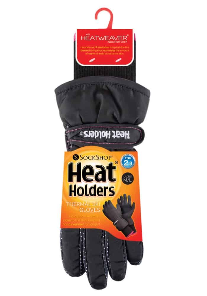 Heat Holders Thermal Ski GlovesWhether to go skiing in, or for general use in the snow, these Heat Holders Ski Gloves will suit the job. Normal Gloves can get freezing and damp after a while out in the snow, that is why these shower and wind proof Gloves have been made, to make sure your hands are kept warm and dry throughout the day!These Gloves have an outer which will keep away showers and wind, while the lining of the Gloves in the soft and fleece-like HeatWeaver Lining, which is Heat Holders plush fur lining which keeps the maximum amount of heat close to the skin for longer. They also have an adjustable wrist strap to help you get the best fit, as well as a longer cuff which hugs the wrist to keep in the warm air and stop wind and cold air from coming in. The palm and thumb of these Gloves has extra grip to make sure that you have full control of your hands while skiing or any other activity. These ladies ski Gloves come in 2 sizes S/M and M/L and have polka-dot patterned panels on them to give them some cute femininity. Mens sizes are also available. Extra Product Details- 1 Pair- Thermal Ski Gloves- HeatWeaver Fleece lining- Adjustable wrist strap- Comfortable cuff- Palm / thumb grip- 2 sizes- Wind & Shower proof- Great for skiing- Outer: 100% Acrylic. Inner: 100% Polyester