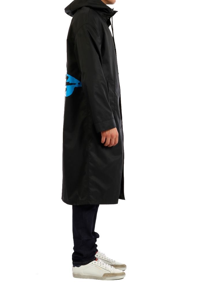 Raincoat designed in collaboration with Undercover and made of black nylon with 