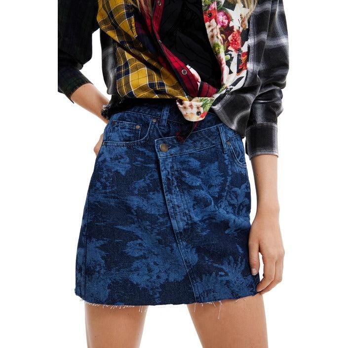 Brand: Desigual
Gender: Women
Type: Skirt
Season: Fall/Winter

PRODUCT DETAIL
• Color: blue
• Pattern: print
• Fastening: zip and button

COMPOSITION AND MATERIAL
• Composition: -100% cotton 
•  Washing: machine wash at 30°
