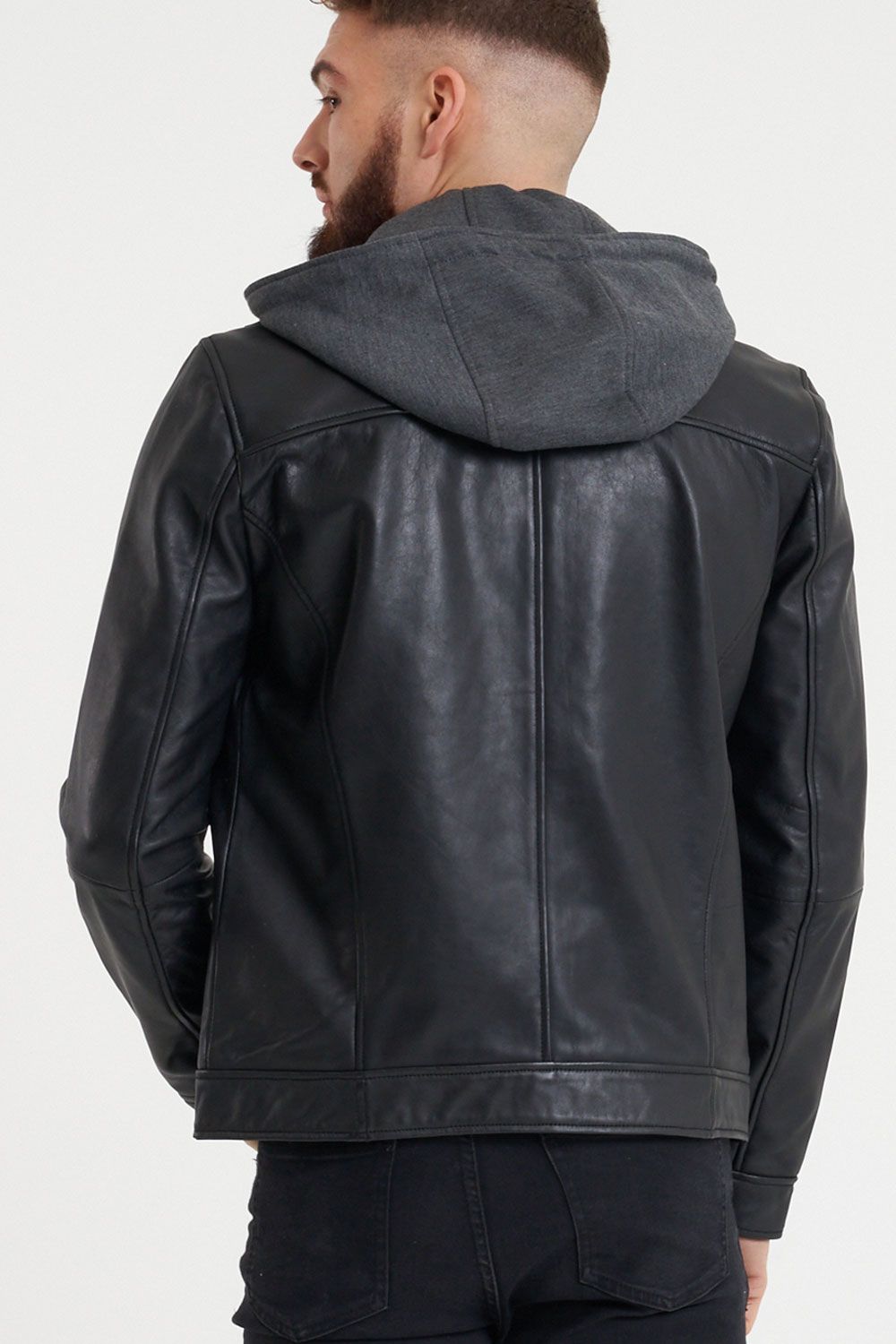 This black leather jacket features a grey jersey hood. The jacket has a symmetrical zipline which is the hallmark of all classic racer jackets. It is made from 100% soft sheep nappa leather.
