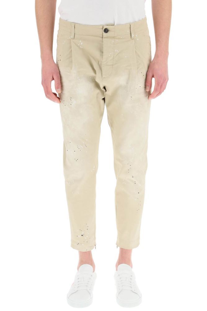 Dsquared2 chino trousers in stretch gabardine with spotted-look finish. Hand Me Down fit featuring low waist, front pleat and slim leg with cropped length. Invisible zip at the ankles, button fly, four pockets. 