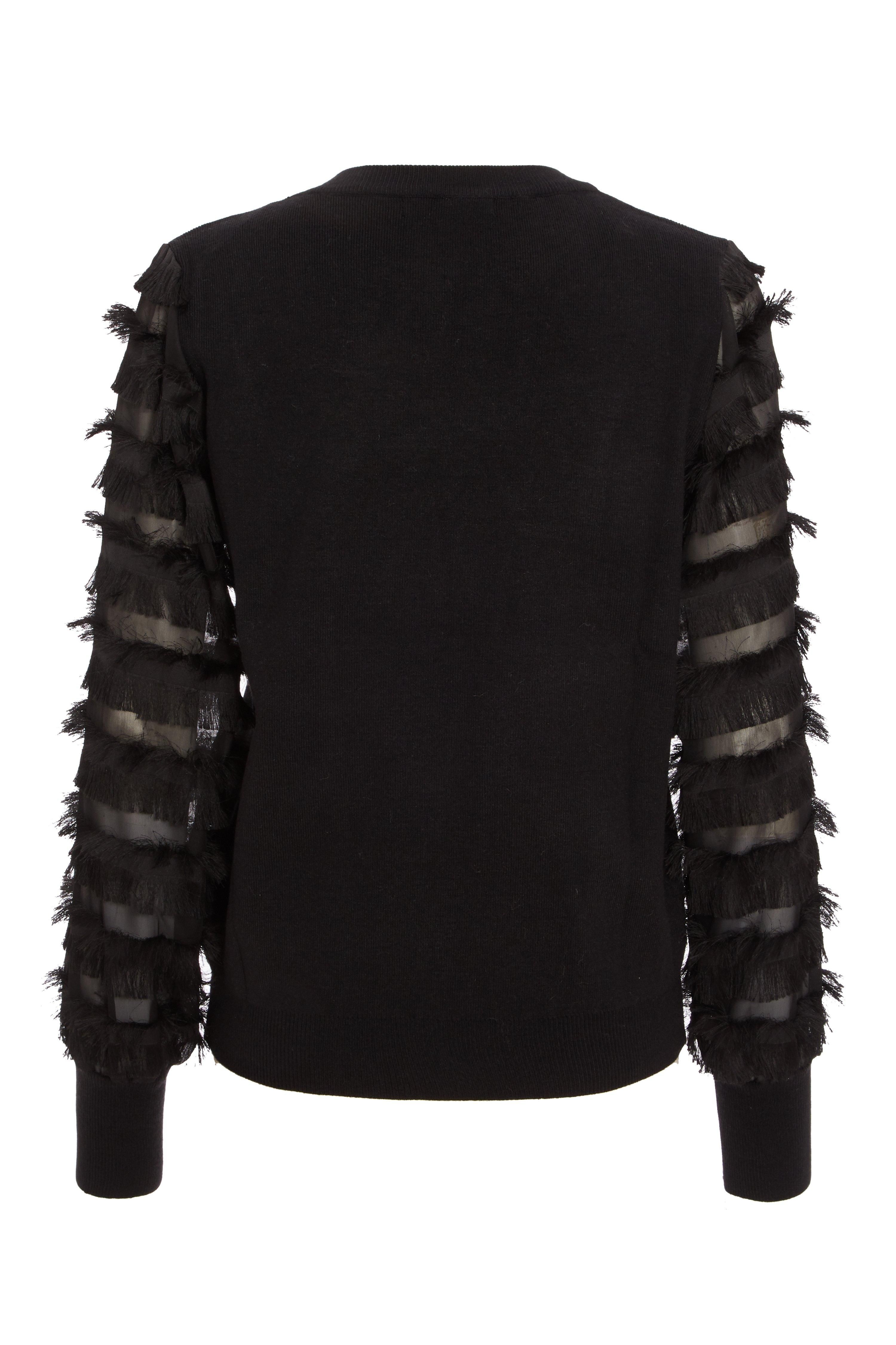 - Knitted jumper  - Fringe sleeve  - High neck  - Mesh detail  - Length: 65cm approx
