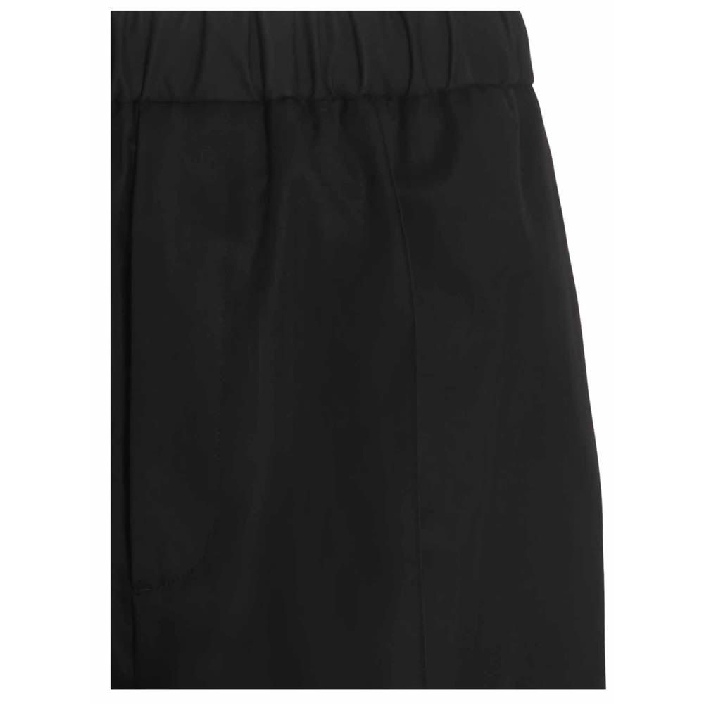 Cotton trousers with an elastic waistband, an inner drawstring at the waist and a straight leg.