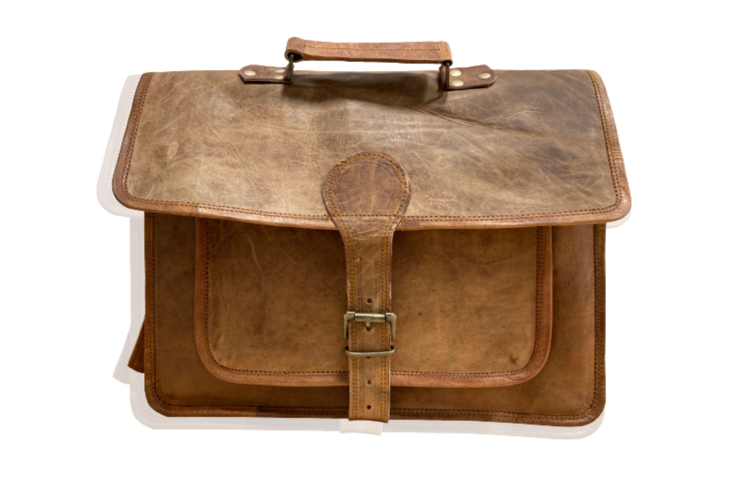 This satchel briefcase is made from vintage leather that is aged and has the desired effect of being “worn and used”. There are imperfections in the leather which add to the character of the bag, creating a vintage effect that will stay in fashion for years to come.
The main flap, secured by the front adjustable strap, opens on three main compartments.
The satchel also features various pockets, perfect to store all your essentials; the bag has a front pouch, two inner zipped pockets and two side pockets with an adjustable strap closure.
The bag has an adjustable and matching shoulder strap.
Dimensions: W (37.0cms), L (30.0cms), H (10.0cms)