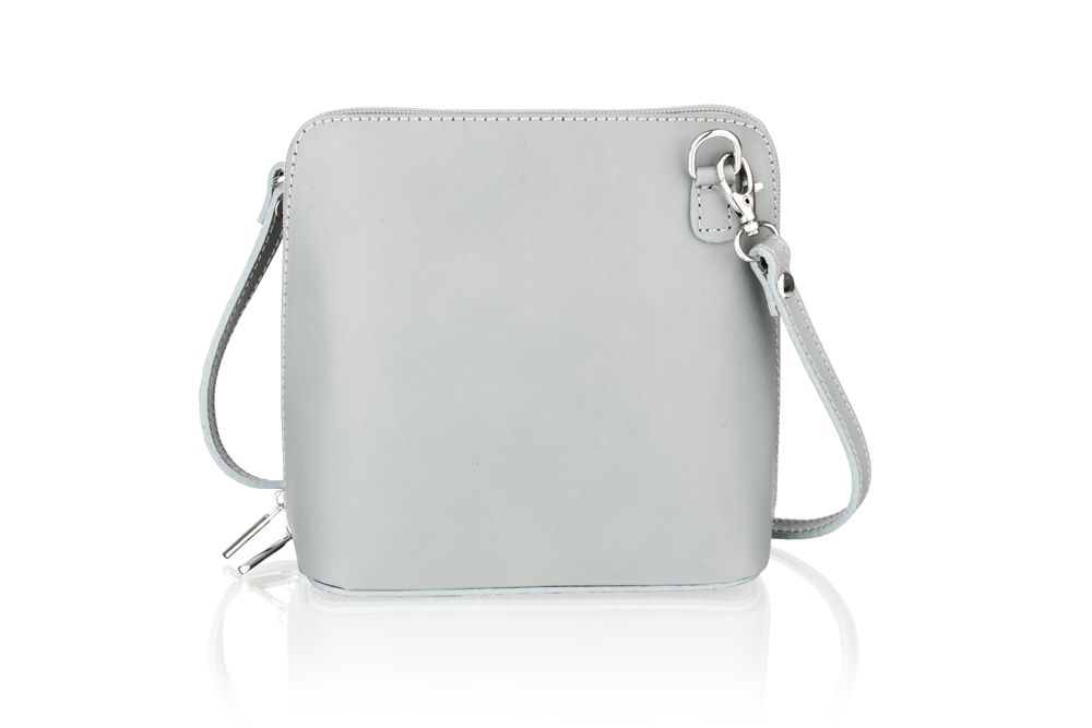 MADE IN ITALY - This is a petite Italian leather bag with a silver double zip so you can open and seal the bag from left to right and vice-versa. The leather is smooth and of high quality hide yet robust and made in Italy and of course Vera Pelle which means real leather. The top right hand side of the bag features a silver buckle allowing the user to attach a shoulder strap to the bag, the other end of the strap attaches to a buckle on the reverse of the bag. The reverse of the bag features a small zip pocket. The internals of the bag feature a small cosmetic zip pocket. The internals of the bag are fully lined in a cotton material. The bag features contrast stitching throughout. Dimension: H (16.0cms), L (16.0cms), D (8.0cms).