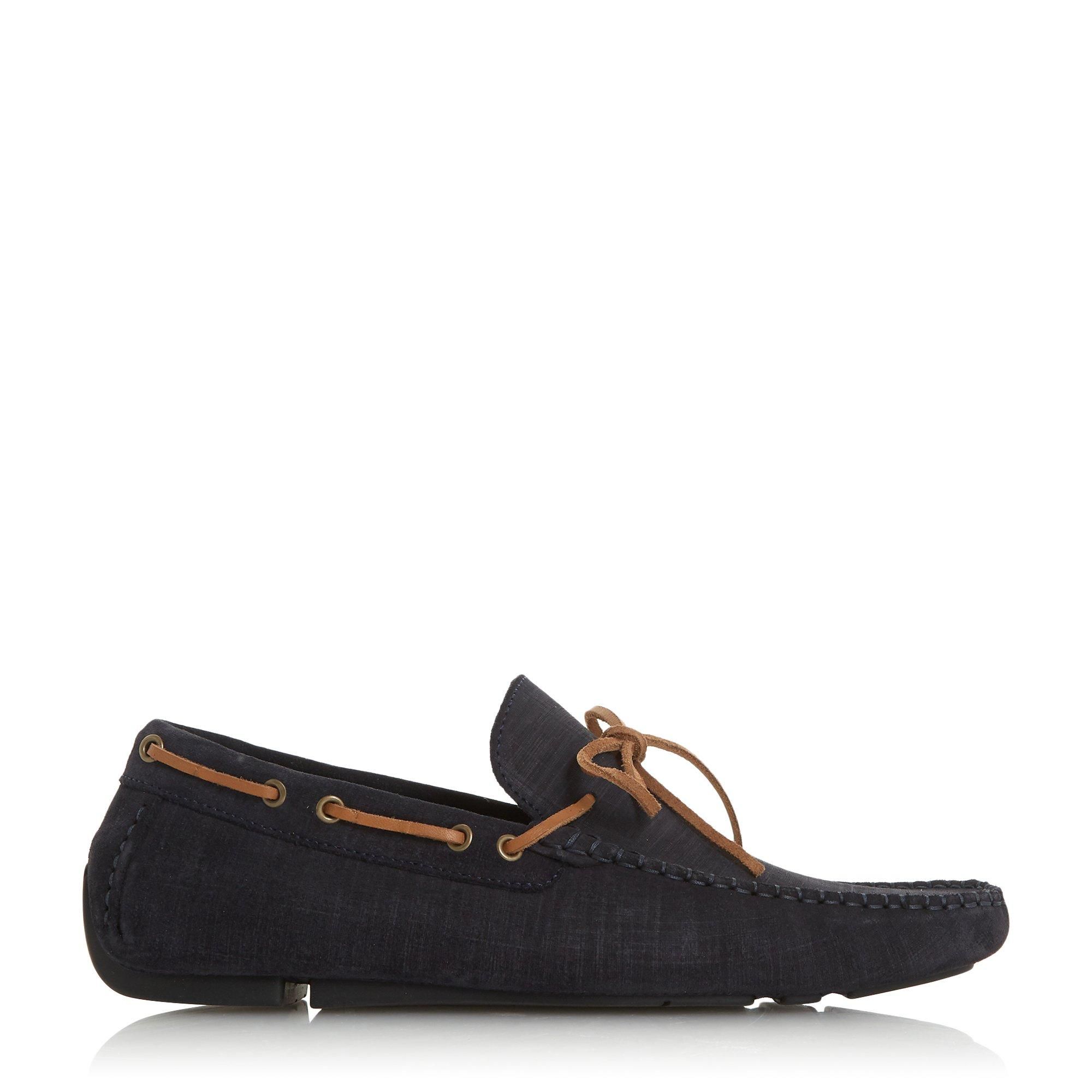 This handsome loafer is the perfect choice for updating your line-up. In a classic slip on moccasin design with a self tie lace upper. It's complete with a cushioned footbed for exceptional comfort.