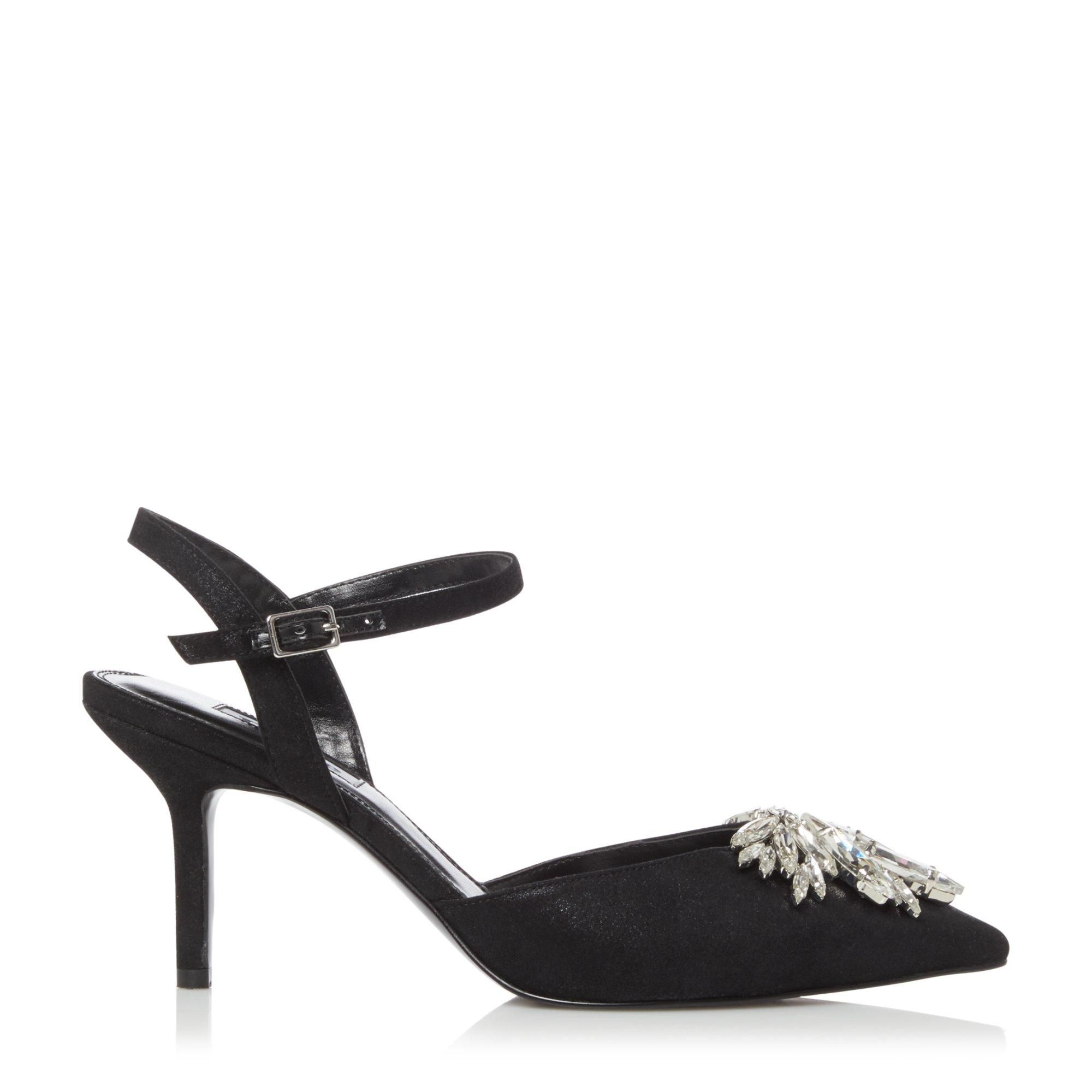 Sophisticaed glamour brought to you with the Cherish heels. These open back court shoes feature a sparkling jewel detail. Thin ankle straps and a thin stiletto adhere to their delicate look.