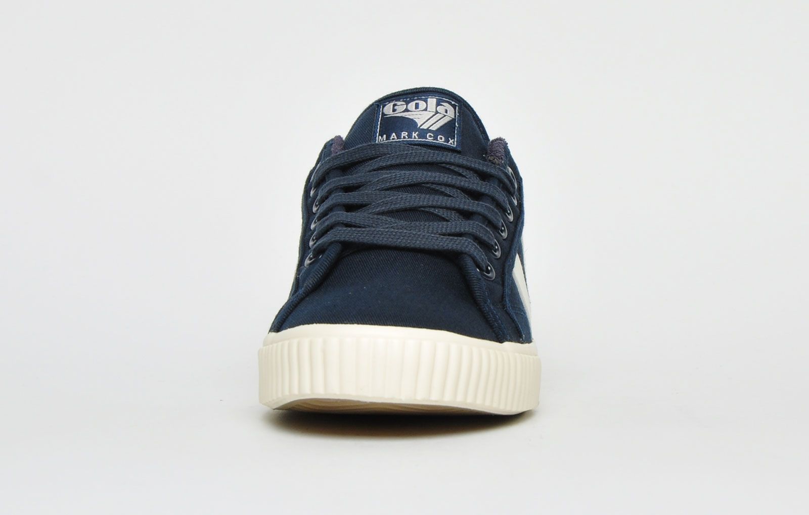 The Gola Classics Tennis Mark Cox is an update of the original Gola Tennis shoe design from 1973. Featuring a navy canvas textile upper with contrasting Gola branding and a sleek vintage styled sole to give a clean and fresh look. Offering enhanced comfort with a padded soft brushed lining and padded insole, its versatile style can be teamed with a variety of looks to add a relaxed touch to any outfit. <p>- Retro style trainers</p> <p>- Vegan Friendly</p> <p>- Soft lining for additional comfort</p> <p> - Premium canvas textile upper</p> <p>- Lace-up closure</p> <p>- Gola Classics branding throughout</p>