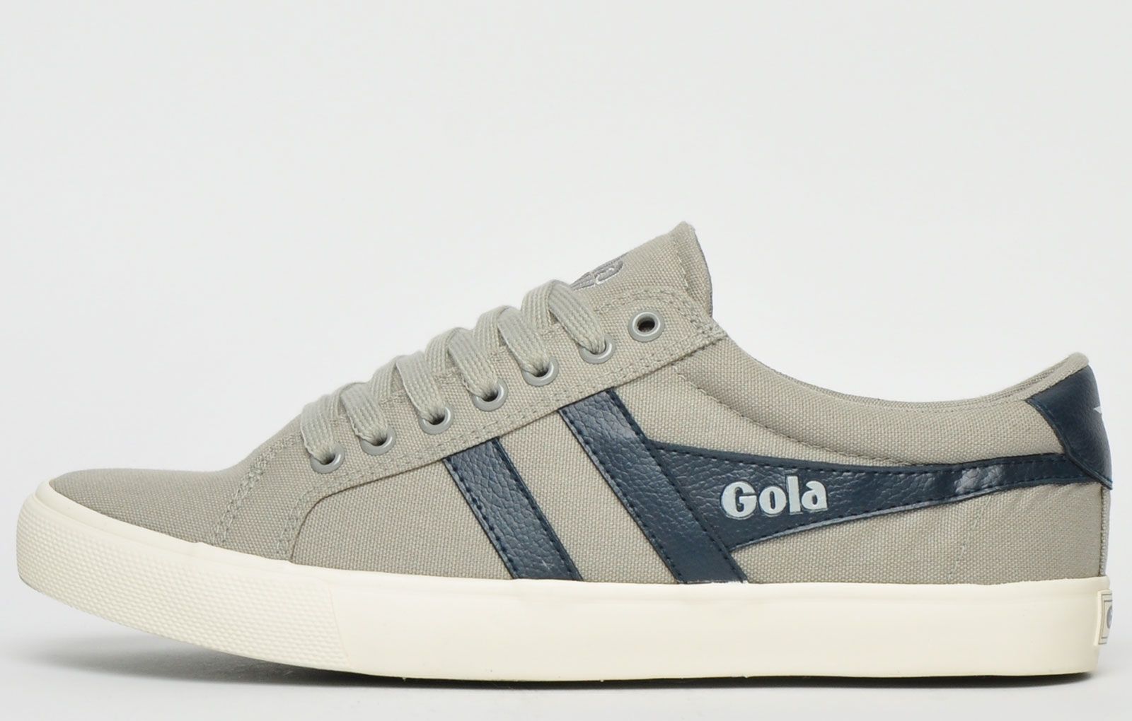 Born in Britain in 1905, Gola holds its British Heritage close to its heart. Gola has been associated with numerous high profile sporting legends over the years and was the number 1 British Sportwear brand of the 1960`s and 70`s. Gola still produces some of the most iconic trainers of today and yester years too by reaching back into its archives to deliver authentic retro styling with occasionally a flavour of modern aesthetics. Gola creates footwear for those who choose not to follow the crowd and who want to stay true to the vintage retro trainer look. <p>Delivered with on trend retro plimsol styling the Varsity from Gola Classics is an old school court inspired plimsoll with a modern twist. The quality canvas upper is contrasted with the Gola wingtip logo to the side upper with a vintage styled wrap around vulc sole unit throwing things back to the days gone by, taking this new men’s Gola sneaker to a whole new styling level. The perfect partner to jeans or shorts this season, the Gola Classics Varsity is a men’s summer wardrobe essential that will never go out of fashion and at this price they won’t be around for long</p> <p>- Strong canvas upper</p> <p>- Classic lacing system</p> <p>- Vintage style vulc outsole</p> <p>- Old school silhouette</p> <p>- Padded ankle and heel collar</p> <p>- Gola Classics branding throughout</p>