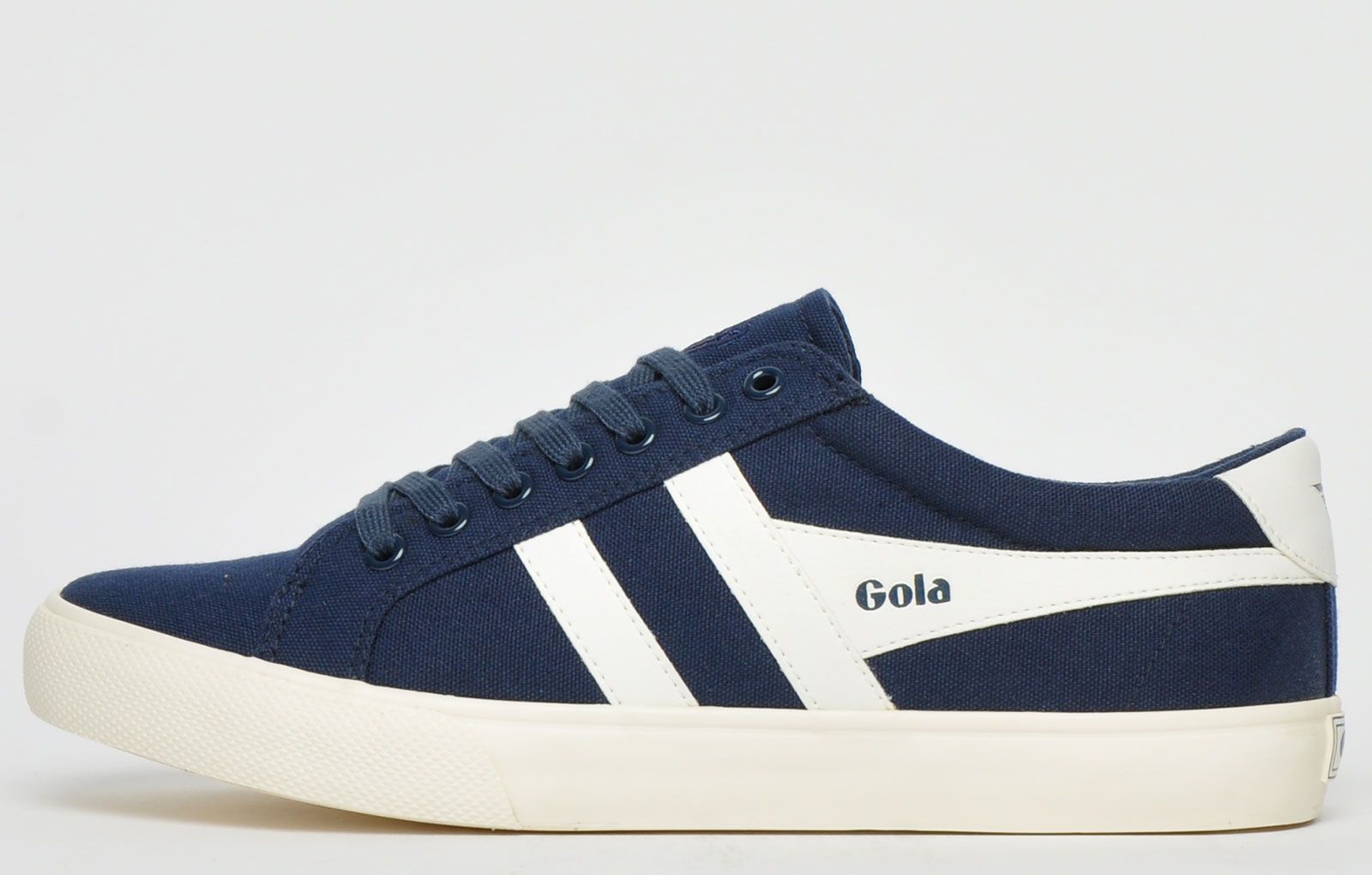 Born in Britain in 1905, Gola holds its British Heritage close to its heart. Gola has been associated with numerous high profile sporting legends over the years and was the number 1 British Sportwear brand of the 1960`s and 70`s. Gola still produces some of the most iconic trainers of today and yester years too by reaching back into its archives to deliver authentic retro styling with occasionally a flavour of modern aesthetics. Gola creates footwear for those who choose not to follow the crowd and who want to stay true to the vintage retro trainer look. <p>Delivered with on trend retro plimsol styling the Varsity from Gola Classics is an old school court inspired plimsoll with a modern twist. The quality canvas upper is contrasted with the Gola wingtip logo to the side upper with a vintage styled wrap around vulc sole unit throwing things back to the days gone by, taking this new men’s Gola sneaker to a whole new styling level. The perfect partner to jeans or shorts this season, the Gola Classics Varsity is a men’s summer wardrobe essential that will never go out of fashion and at this price they won’t be around for long</p> <p>- Strong canvas upper</p> <p>- Classic lacing system</p> <p>- Vintage style vulc outsole</p> <p>- Old school silhouette</p> <p>- Padded ankle and heel collar</p> <p>- Gola Classics branding throughout</p>