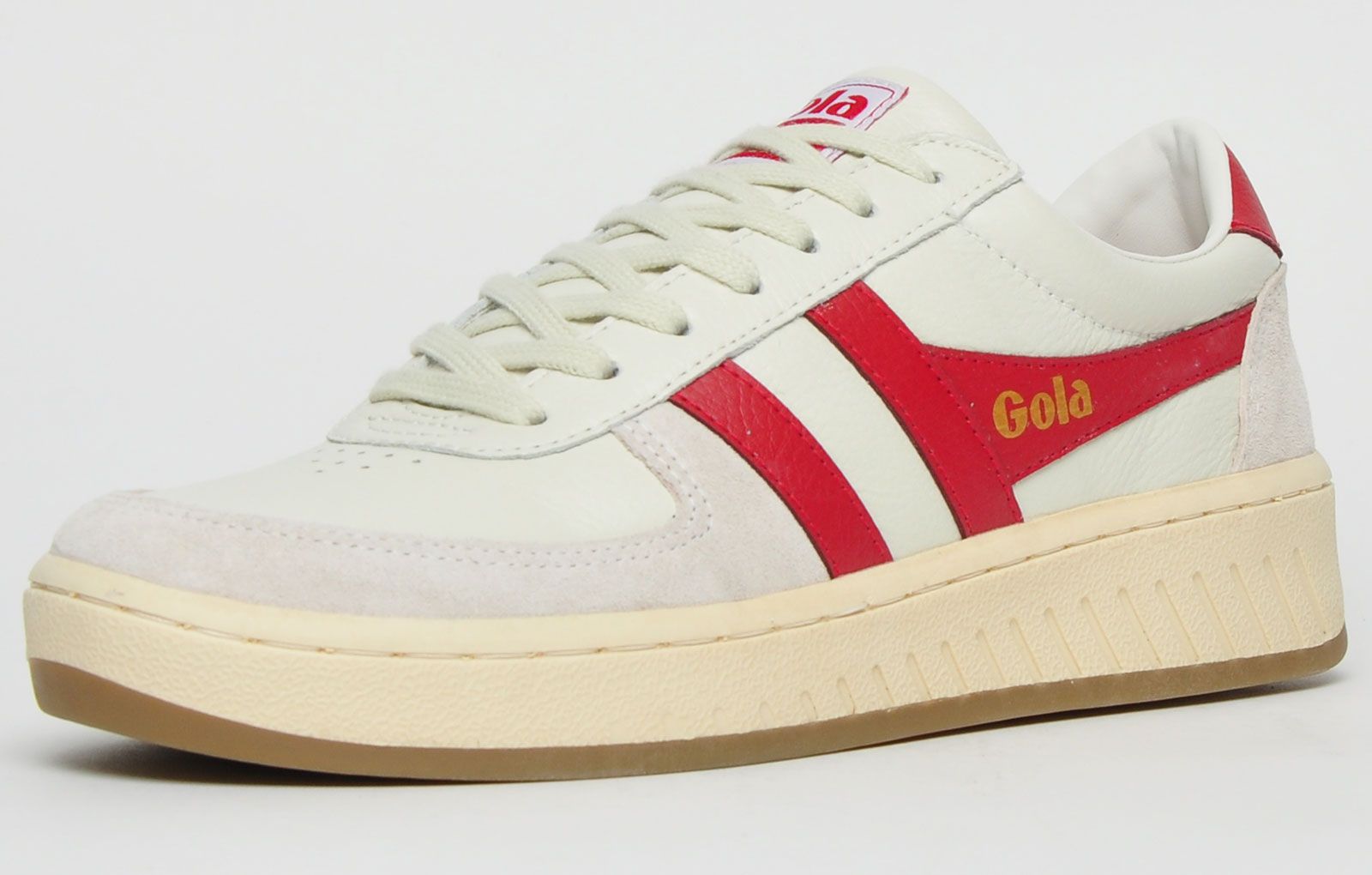 This Gola Classics Grandslam 78 is an on-trend silhouette paying homage to Gola’s British roots with the application of an off white and red colourway and contrast vintage styled outsole. <p>Tonal laces, suede trims and iconic Gola signature details finish the Grandslam 78 trainers off in style.</p> <p>- Leather upper</p> <p>- Vintage retro styling</p> <p>- Secure lace up system</p> <p>- Vintage styled outsole</p> <p>- Gola classic branding throughout</p>