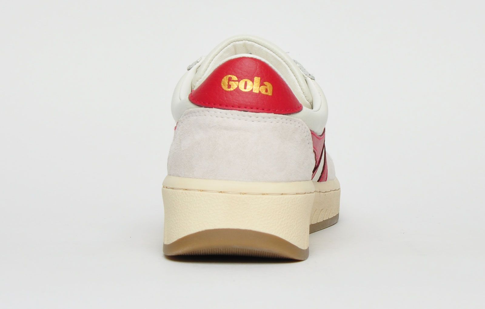 This Gola Classics Grandslam 78 is an on-trend silhouette paying homage to Gola’s British roots with the application of an off white and red colourway and contrast vintage styled outsole. <p>Tonal laces, suede trims and iconic Gola signature details finish the Grandslam 78 trainers off in style.</p> <p>- Leather upper</p> <p>- Vintage retro styling</p> <p>- Secure lace up system</p> <p>- Vintage styled outsole</p> <p>- Gola classic branding throughout</p>