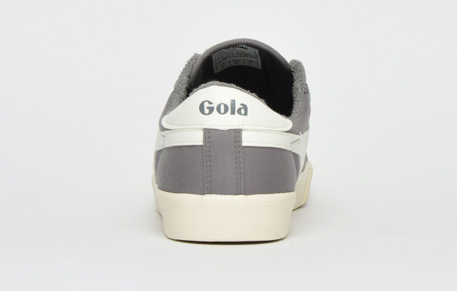 The Gola Classics Tennis Mark Cox is an update of the original Gola Tennis shoe design from 1973. Featuring a ash grey canvas textile upper with contrasting Gola branding and a sleek vintage styled sole to give a clean and fresh look. Offering enhanced comfort with a padded soft brushed lining and padded insole, its versatile style can be teamed with a variety of looks to add a relaxed touch to any outfit. <p>- Retro style</p> <p>- Vegan Friendly</p> <p>- Soft lining for additional comfort</p> <p> - Premium canvas textile upper</p> <p>- Lace-up closure</p> <p>- Gola Classics branding throughout</p>