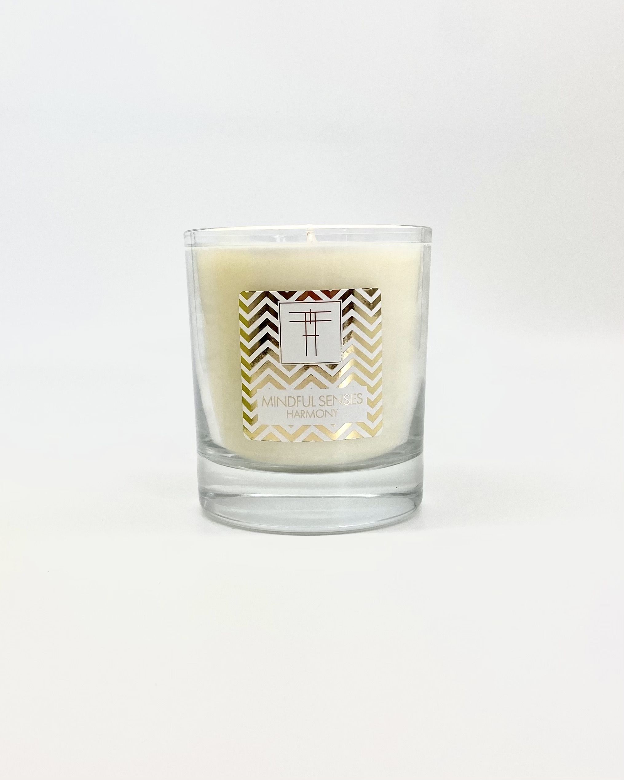 Created to create a calm and restorative enviroment, Mindful senses Candles are emotive triggersof colour, scent and mood. Find harmonious balance and calm amidst the turmoil with this Harmony Candle. Created to open your mind and restore your resilience, this mellow and refreshing candle is scentedwith notes of mandarin, basil, orange, spearmit, tea, patchouli and cedarwood.

100% Natural  organic Soy wax.

100% British designed,cratfed and manufactured.

Size 300cl 45+ Hour burn time.