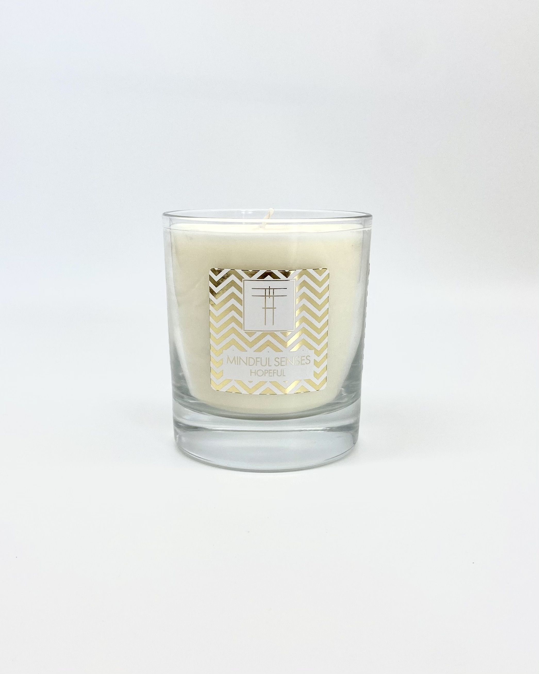 Created to create a calm and restorative enviroment, Mindful Senses Candles, are emotive triggers of colour, scent and mood. connect with your calmer, intuitiveinner self and discover a journey of reflective and balanced perspective. Made with geranium bergamot, orange, tea, and fruits, this fragrant candle envelopes your mind and soul in serenity and hopeful purpose.

100% Natural organic Soy wax.

100% British designed, crafted and manufactured.

Size 300cl 45+ Hour burn.