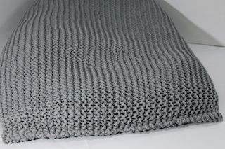 Pouffe with a very resistant mesh and up for comfortable - A beautiful round footstool pouf characterized by a surface in woven cotton thread. - Made of wear-resistant cotton yarn with modern colors - Multi-purpose, can be useful as either a pouf, footstool or just as a decoration - Unique blend of trendy design and easy-care material - Long-lasting and lightweight EPS pearl filling.
 
● Oval pouf with dimensions of 110x70 cm padded with 100% cotton with knitted cover       
● Knitted cotton with light and dark shades in full trend.       
● The padding includes expanded polystyrene, ideal for adapting its shape at any time.       
● No assembly required, so you can enjoy it as soon as you buy it.       
● Pouf with an adaptable design to be the star piece in your living room, room or study.       
● Thanks to the composition of the padding, the pouf adapts to your shape every time you sit down. Modelable until the desired shape is achieved.       
● Being made of 100% cotton, this designer piece can also boast a totally natural fiber production .       
● Ideal for interiors such as living rooms or bedrooms. It is a piece with a design that can be adapted to all types of style and environment.       
Details:
Type: Ottoman oval
Color: light gray, dark gray, blue
Primary material: cotton
Secondary material: polystyrene balls (EPS)
Assembly: does not require assembly
Maximum load: 120 kg
Strengths: Maximum seating comfort, Top level assembly, Modern design, Multifunctional, Made with care and precision.
 
Dimensions:
Width: 70 cm
Depth: 110 cm
Weight: 3.5 kg
