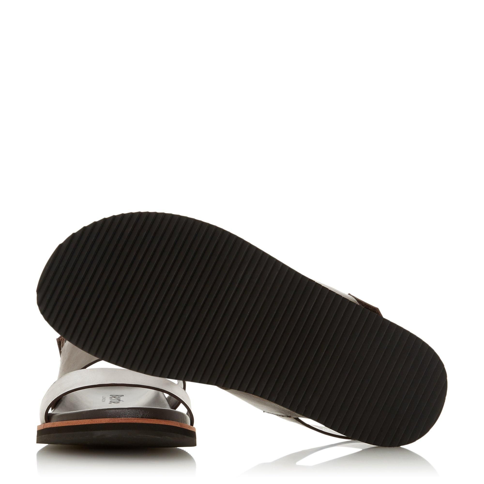 Upgrade your poolside edit with the Irons strap sandal from Bertie. Crafted in smooth leather, it features a sleek double strap design. With a classic wedge sole for style and comfort throughout the day.