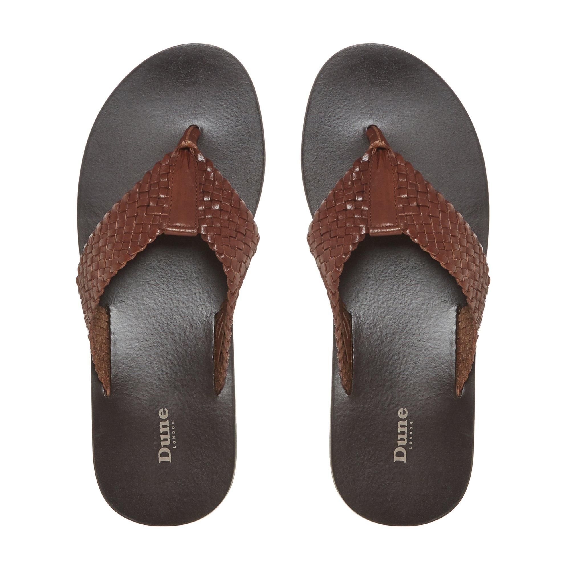 Prepare for warm weather with these woven sandals from Dune London. Made from leather, the woven toe-post straps offer textured interest. Its soft footbed offers enduring comfort while you're out and about.