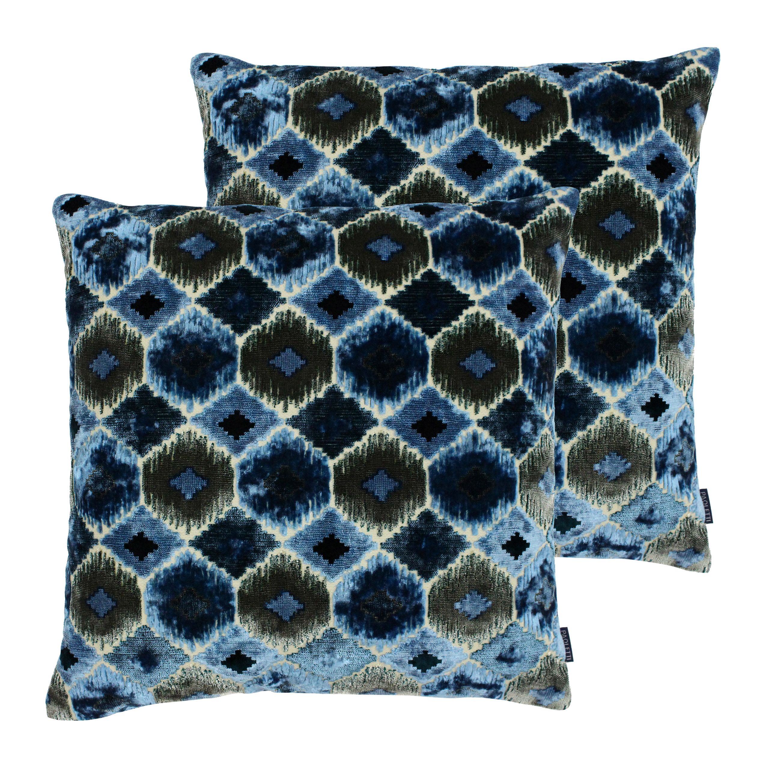 Bringing bold patterns and untamed potential to the table, the Paoletti Ares cushion is a striking choice not for the faint of heart. This distinct cushion features a modern Ikat print of a tribal geometric design. The shimmering thread and textured jacquard weave gives this cushion a unique look and provides a modern take on a global inspired design. Each larger-than-average cushions would work well as an eye-catching piece and with its soft knife edges it will be ideal for sofas and beds. Made with 68% hard-wearing polyester and 32% lustrous viscose you'll find this cushion irresistible to hold. To keep it looking bold and beautiful dry clean this cushion only. Use a cool iron when necessary for the best results.