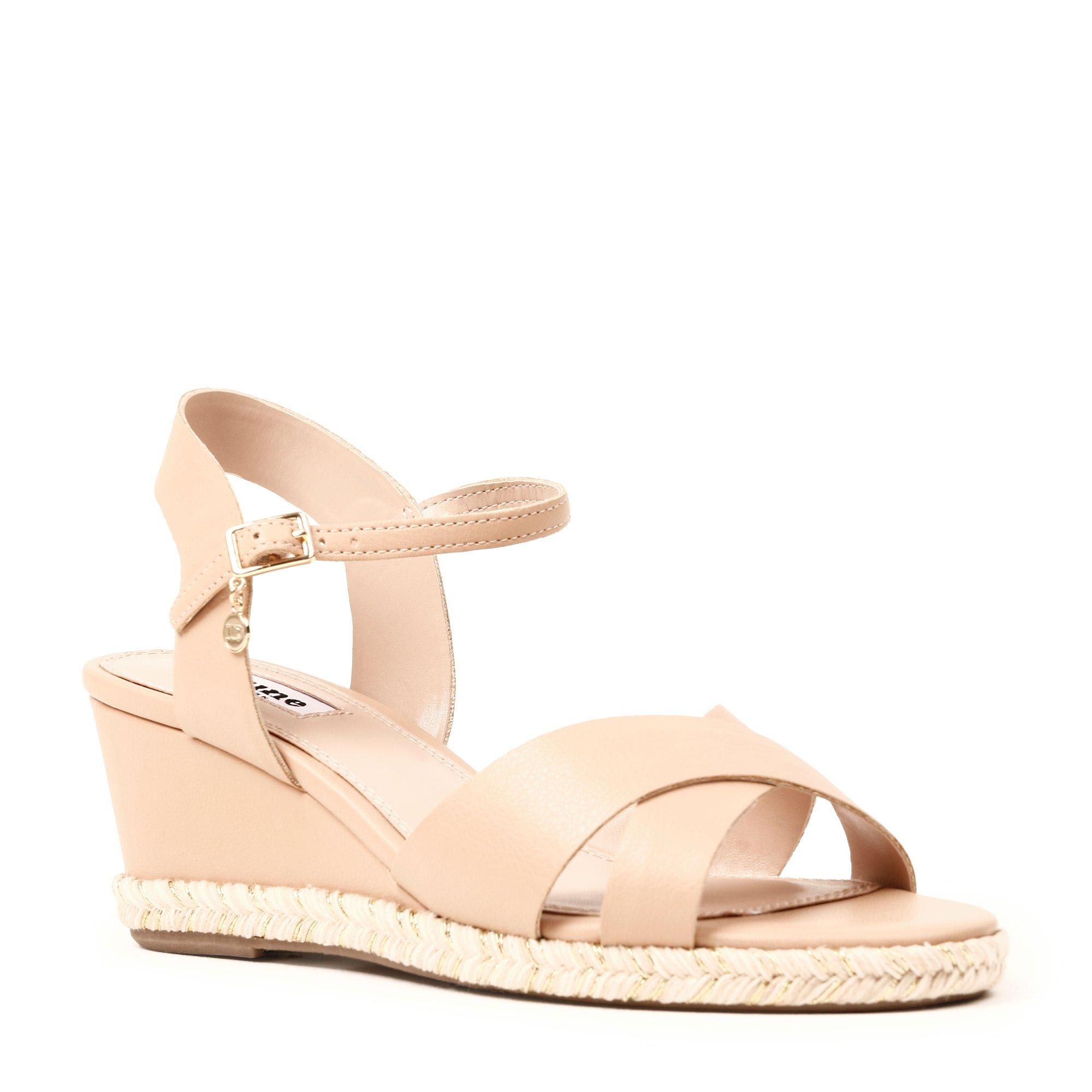 Elevate your summer looks with this wedge sandal from Dune London. Featuring crossover straps and an espadrille trim. It's finished with a mini logo charm at the strap.
