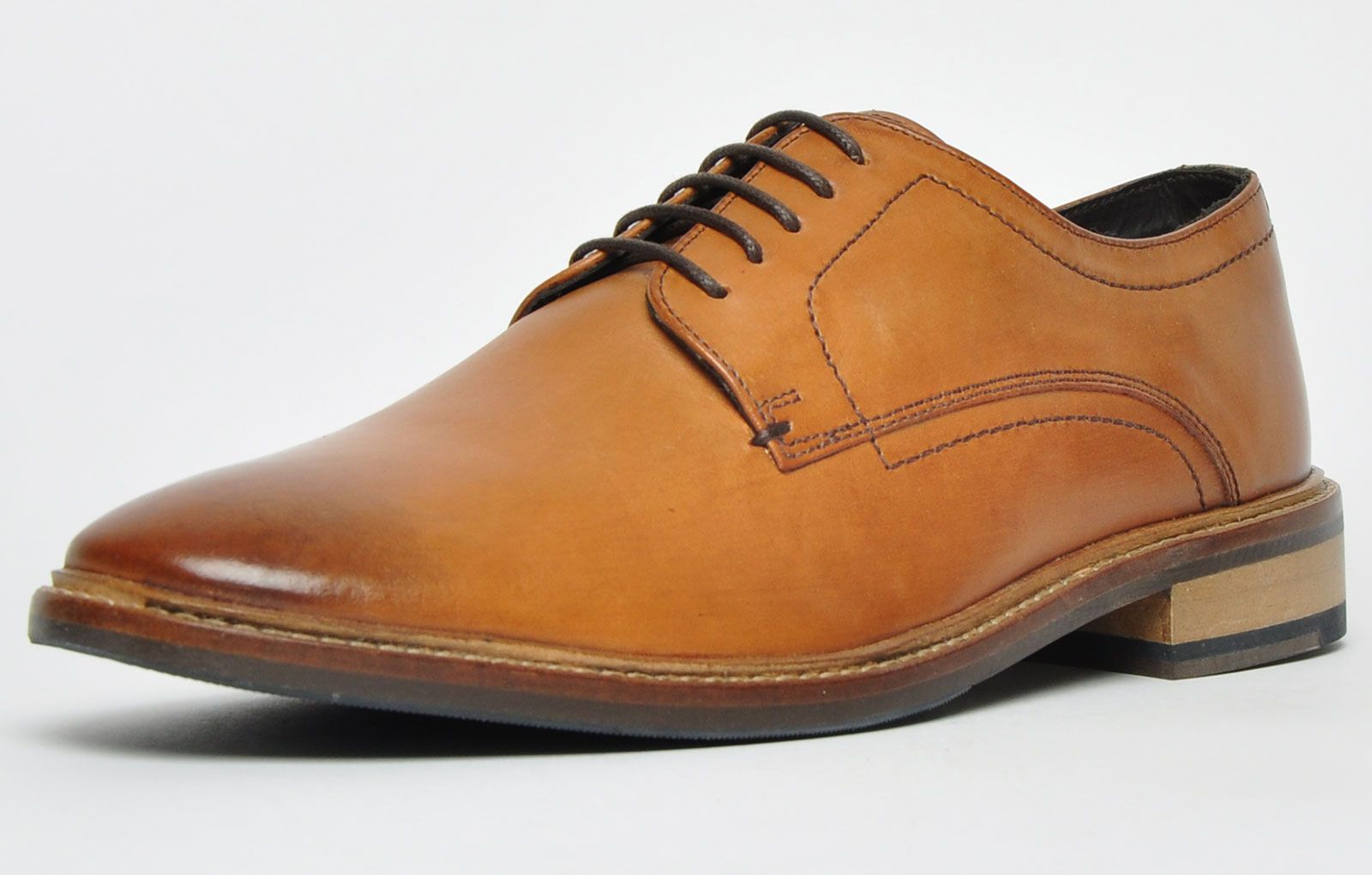 Crafted from quality soft leather in a well sought-after tan colourway, the Conrad has a smooth finish that would upgrade a smart look or add an elegant touch to any smart-casual outfit. <p>These Ikon Conrad men’s premium leather shoes feature a full lace up front, combined with a premium leather textile inner lining, providing a comfortable and secure fit throughout all wear. The durable outsole with stitch detailing provides fashionable retro styling making these Conrad shoes an absolute fashion must have.</p> <p style=