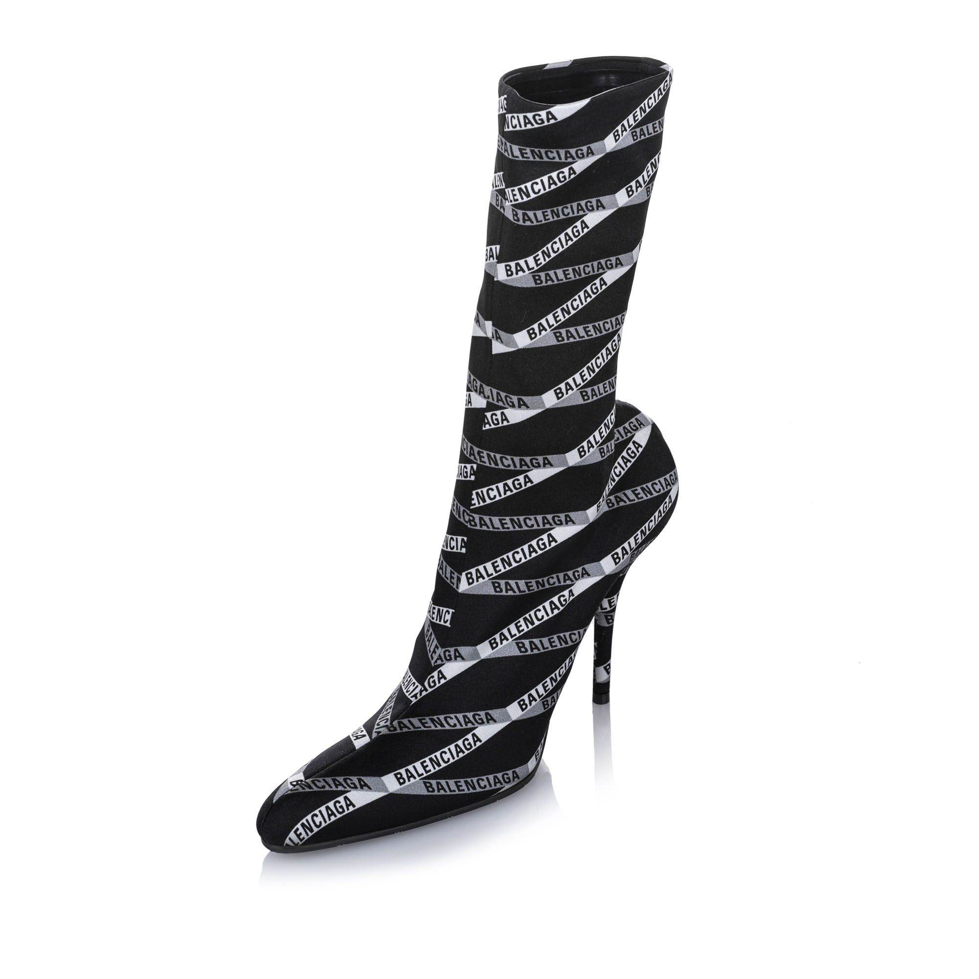 These boots feature a printed jersey crepe upper, leather insoles, stiletto heels, and leather soles. Heel height: 8 cm.
Dimensions:
Length 23cm
Width 7cm

Original Accessories: Dust Bag, Box

Serial Number: 549784
Color: Black x White
Material: Fabric x Others x Leather x Calf
Country of Origin: Italy
Boutique Reference: SSU80324K1342


Product Rating: New