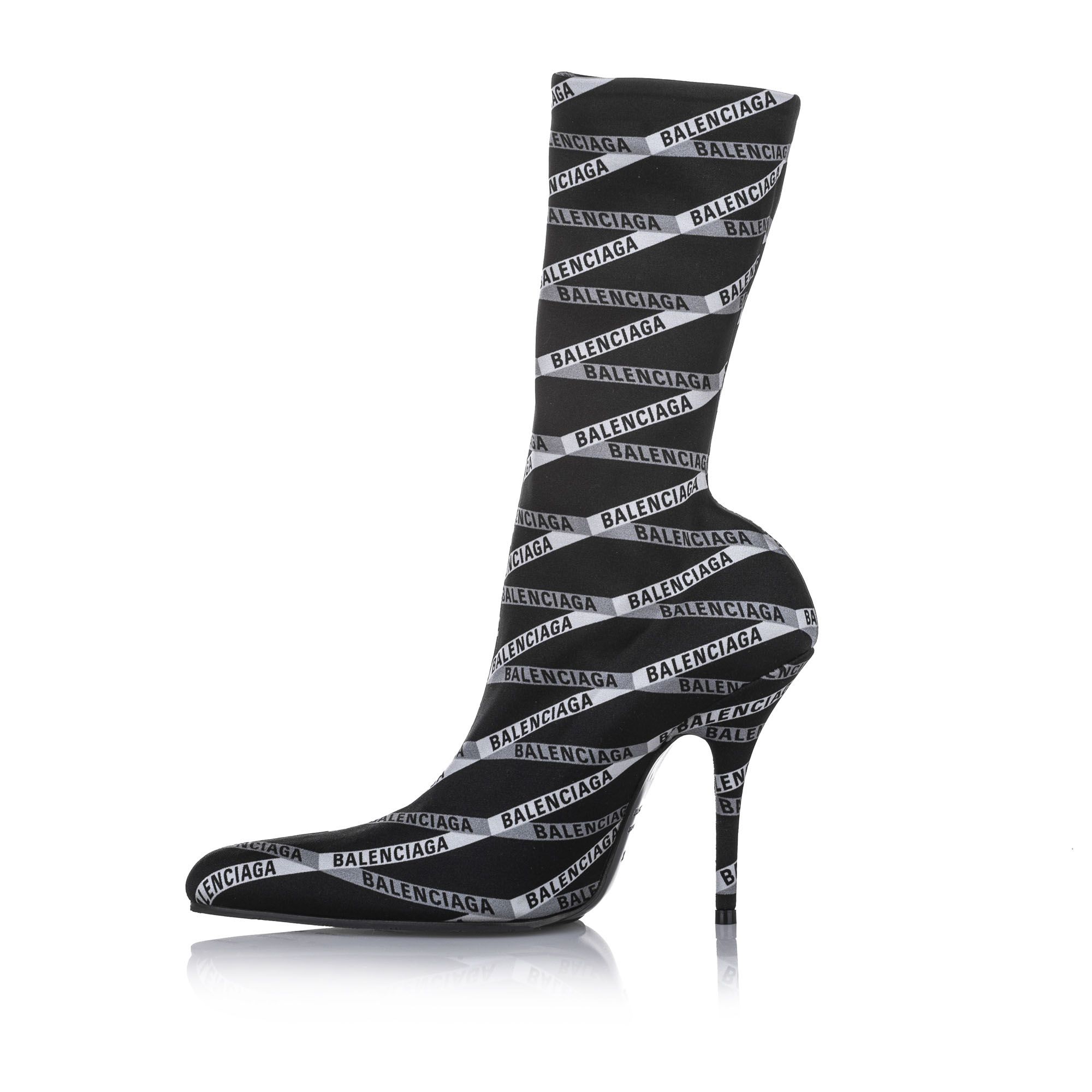 These boots feature a printed jersey crepe upper, leather insoles, stiletto heels, and leather soles. Heel height: 8 cm.
Dimensions:
Length 23cm
Width 7cm

Original Accessories: Dust Bag, Box

Serial Number: 549784
Color: Black x White
Material: Fabric x Others x Leather x Calf
Country of Origin: Italy
Boutique Reference: SSU80324K1342


Product Rating: New