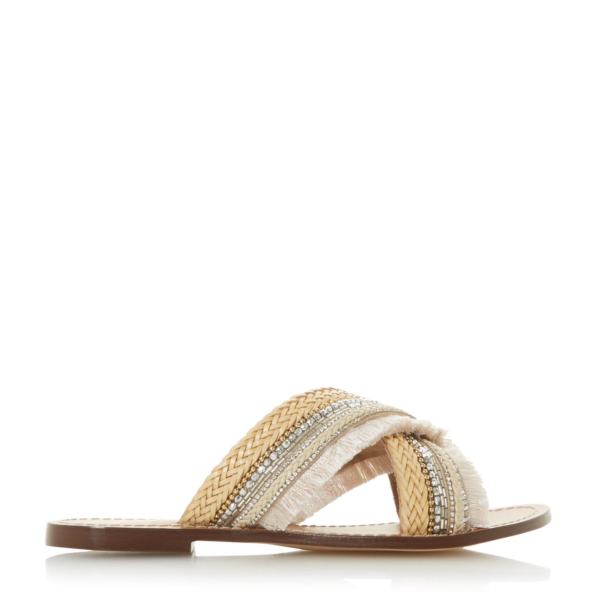 Upgrade your casual footwear with this sandal from Dune London. Showcasing an embellished fringed detail at the upper. The crossover straps and flat sole complete the design.
