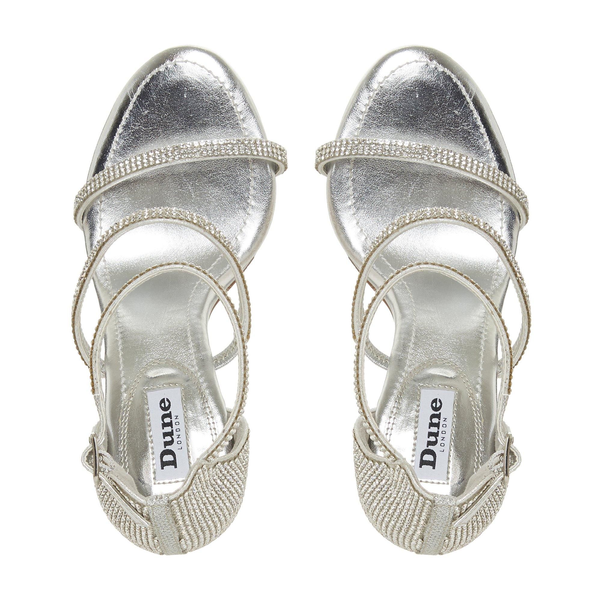 Lend a touch of sparkle to your footwear with the Maxie sandals. Adorned with all-over diamante details and resting on a high stiletto heel. It features two thin straps across the foot and a buckled ankle strap.