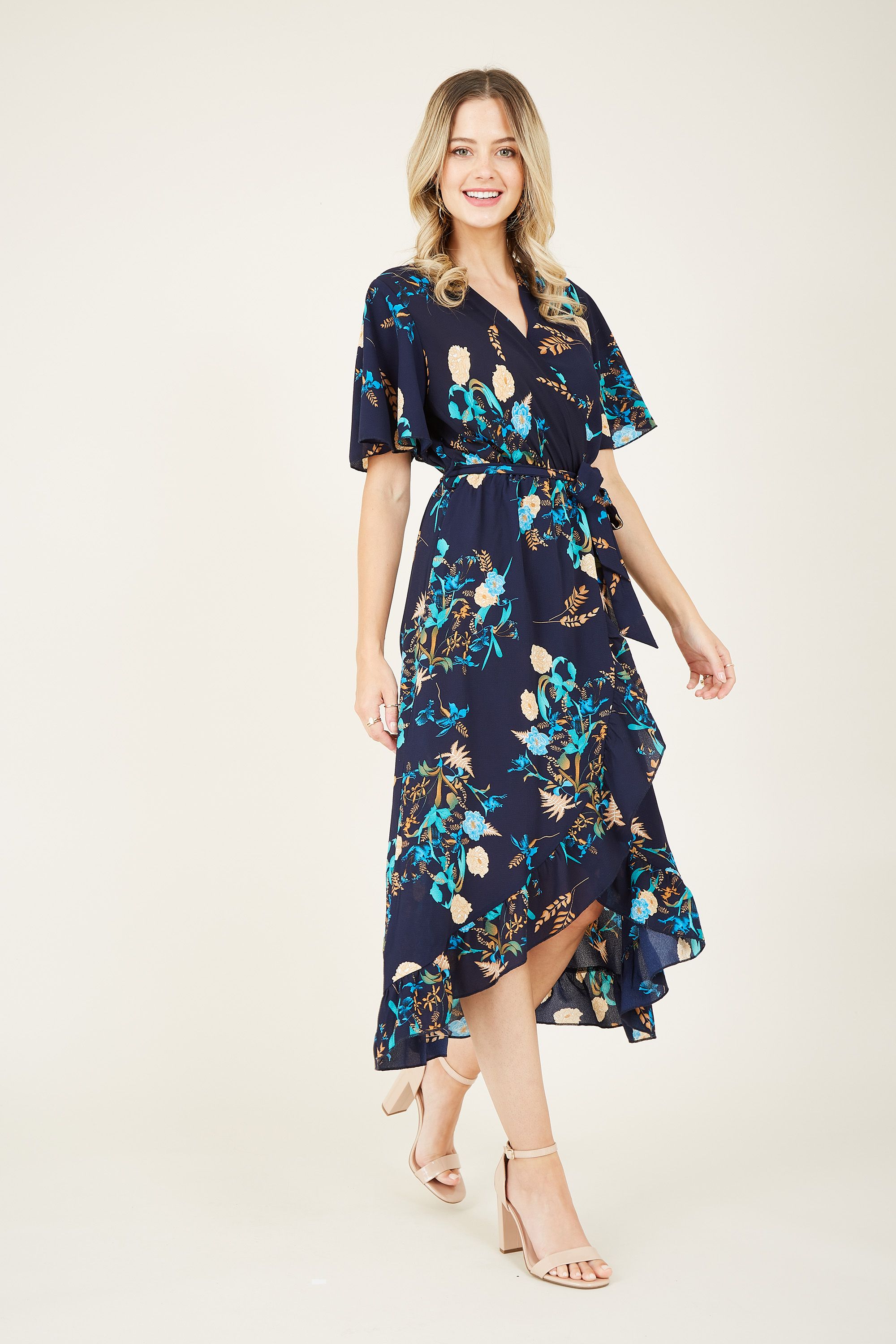 With a bold print, this Mela Floral Midi Dress will gives off an elevated yet casual charm that's perfect for every climate. Cut below the knee, it's designed in a feminine wrap shape that cinches at the waist and floats into ruffles. It's soft, stylish and suitable for all occasions.