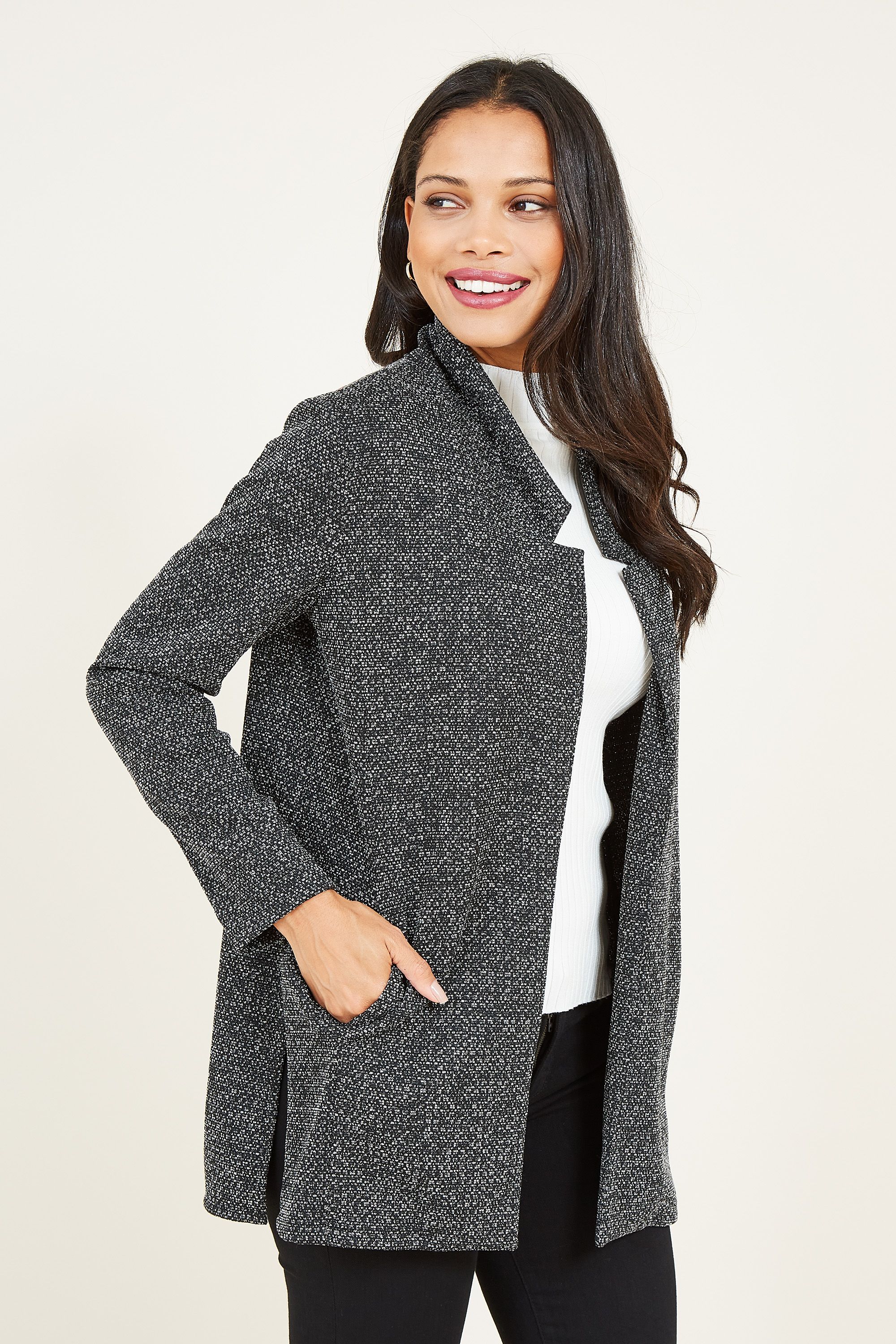 Perfect for adding an extra touch of warmth to your look, opt for this Mela Textured Jacket. With a relaxed silhouette that's perfect for throwing on over your off-duty look, it's cut from soft knitted fabric. Long sleeves add modern shaping, whilst the textured fabric is both soft-to-touch and a style feature.
