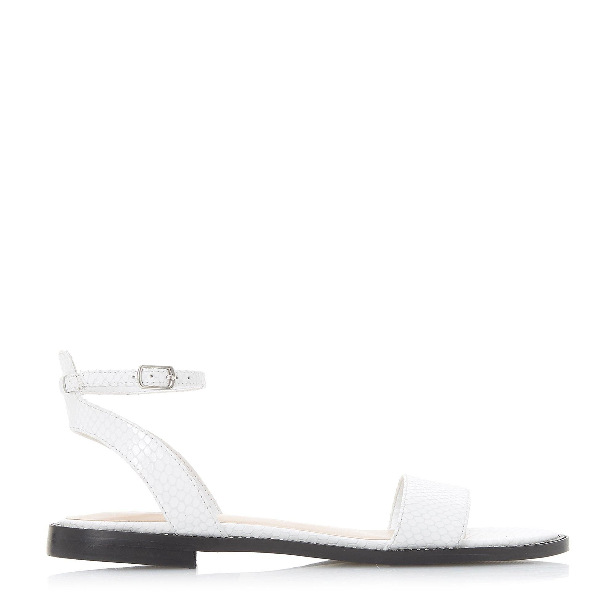 The Dune London Nance two part sandal is a chic summertime style. Featuring a textured slim front strap, an open back and ankle strap. It's perched on a low block heel with an understated studded trim.