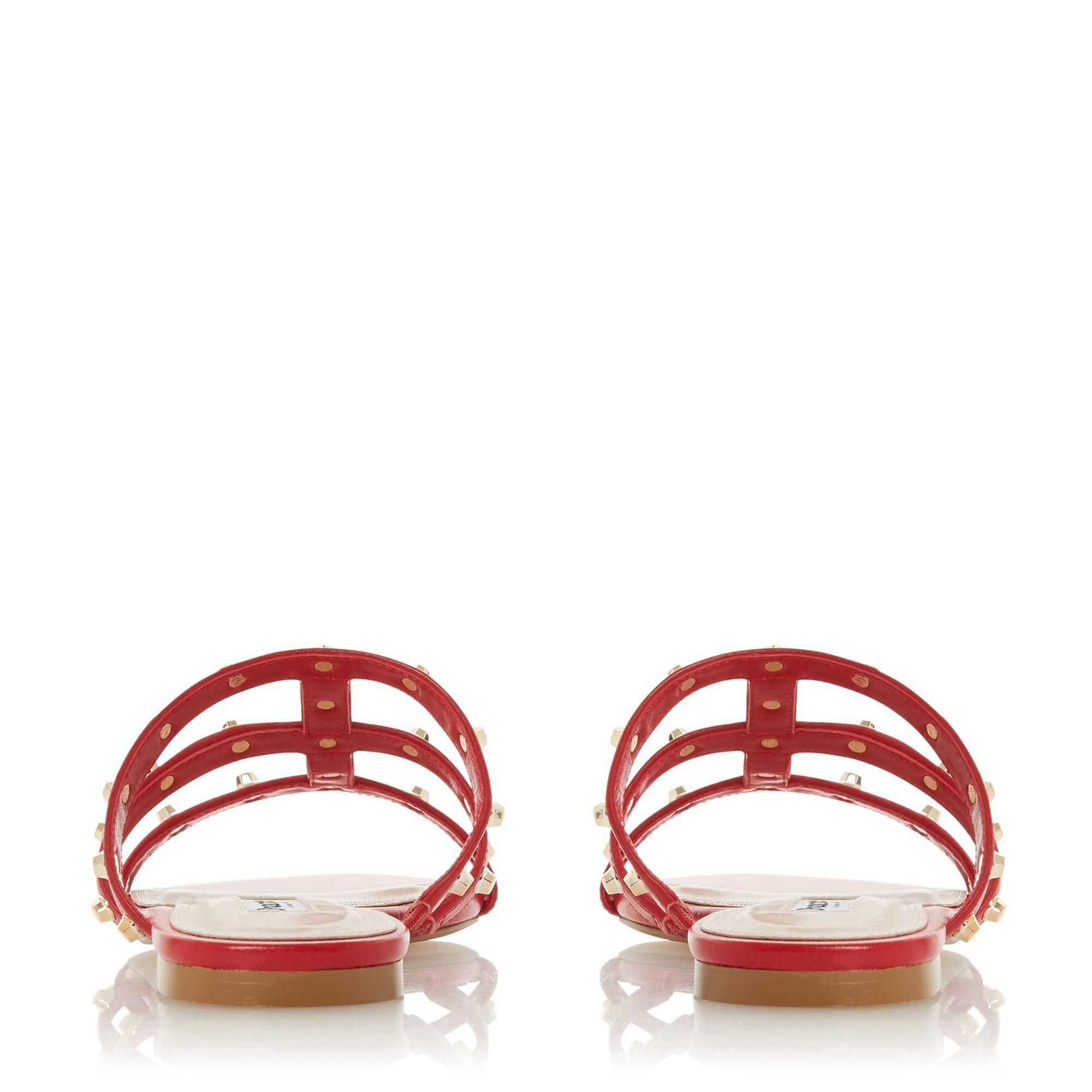 The Nashvill sandal from Dune has a stylish gladiator-inspired design. In an easy slip-on style, it's accented with studded details. A staple style to add to your summer footwear lineup.