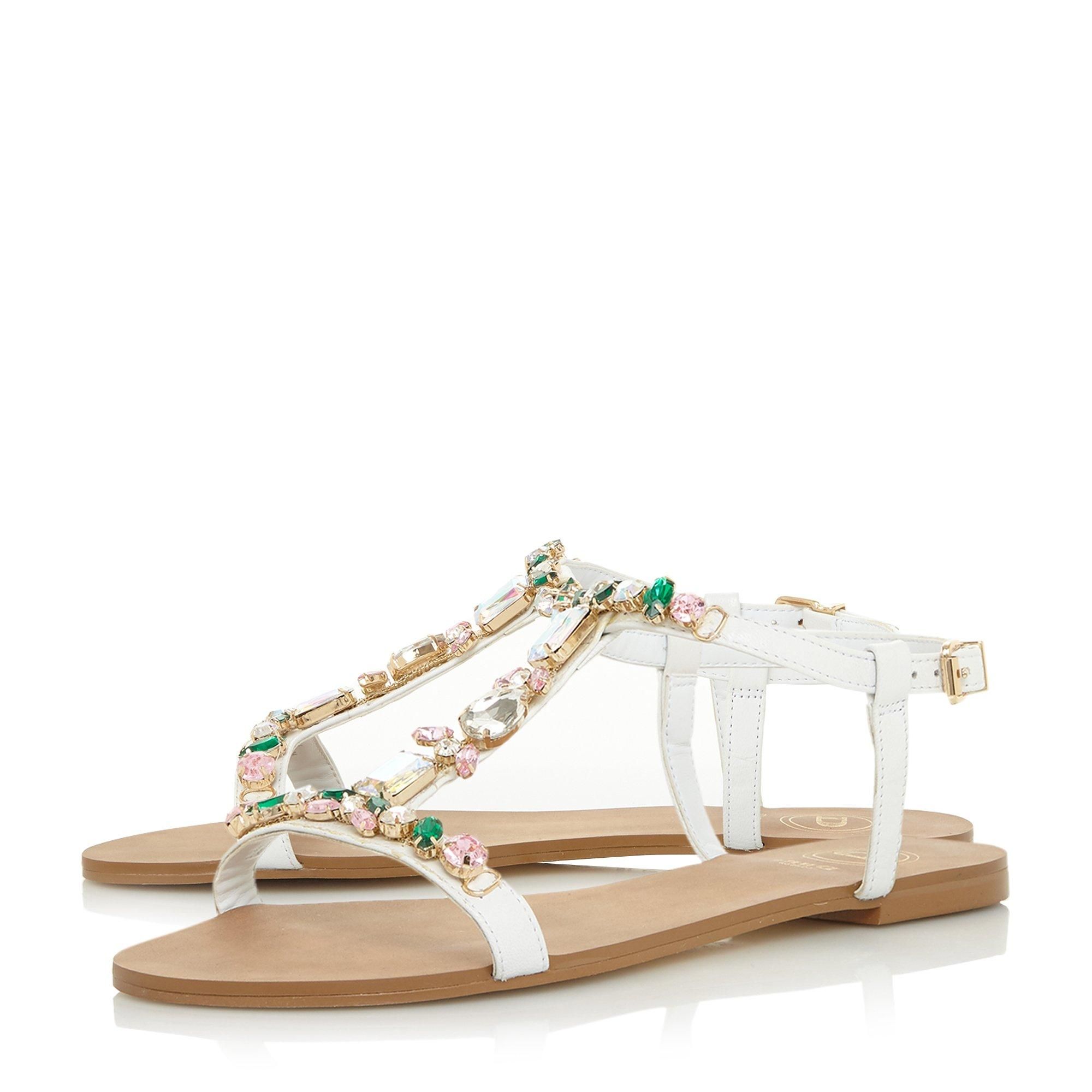 Complete your summer edits with the versatile Natally sandal by Dune. Secured with a gold-toned buckle fastening, it sits on a low block heel. The exquisite stone accents add a sparkling finish and a hint of glamour.