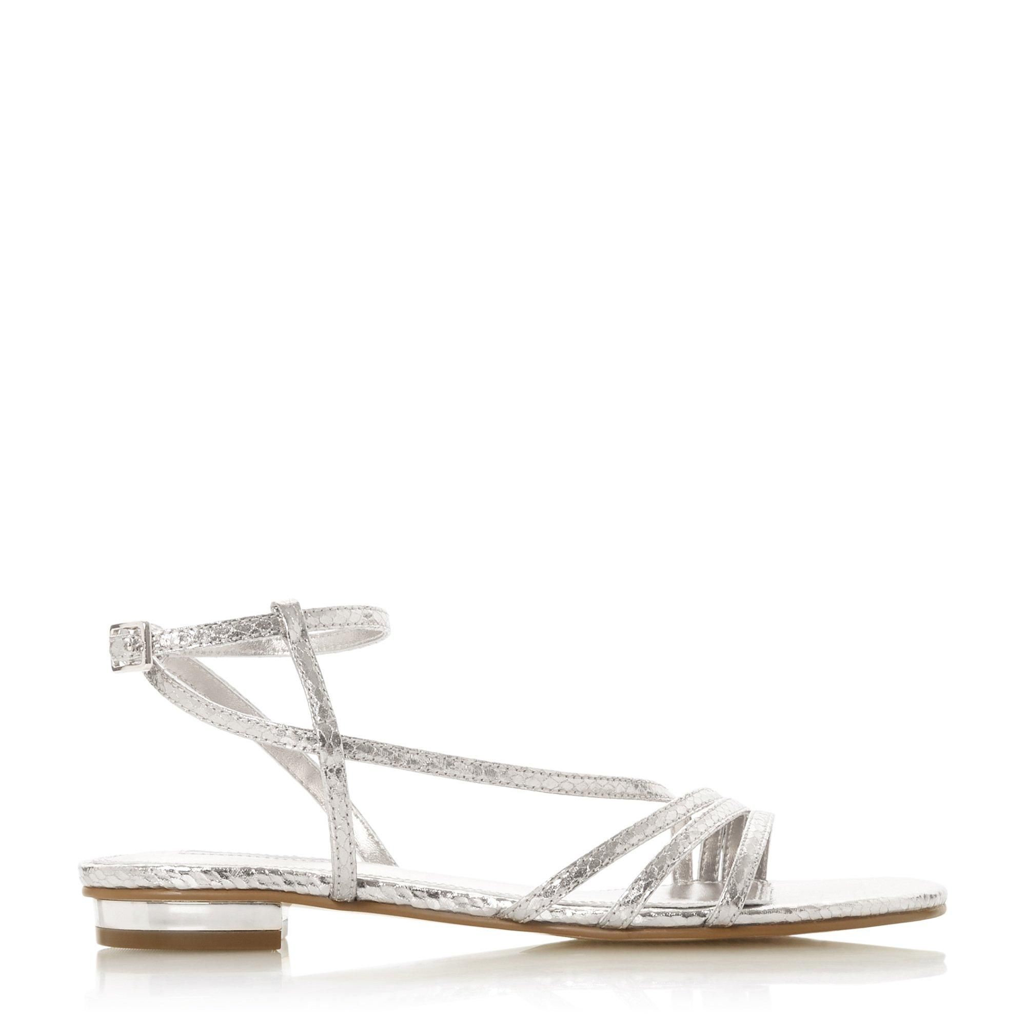 Prep your summer edit with the Nissey sandal from Dune London. With an asymmetric design, it has three straps and a buckle closure. Complete with an open sandal toe and a low block heel.