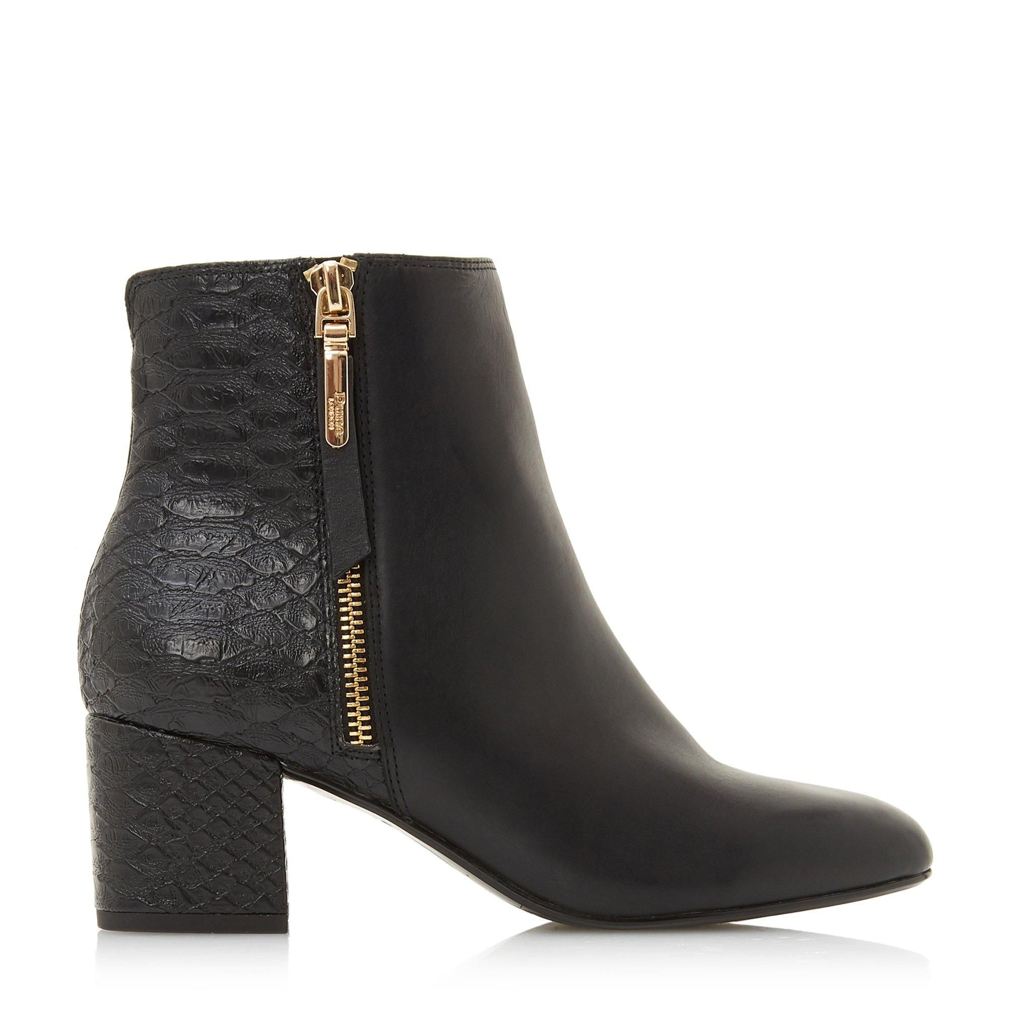This Orrla ankle boot by Dune London is an everyday essential style. The sleek side zip silhouette features a round toe and a low heel. Great for both day and evening, it's the perfect fit for any outfit.