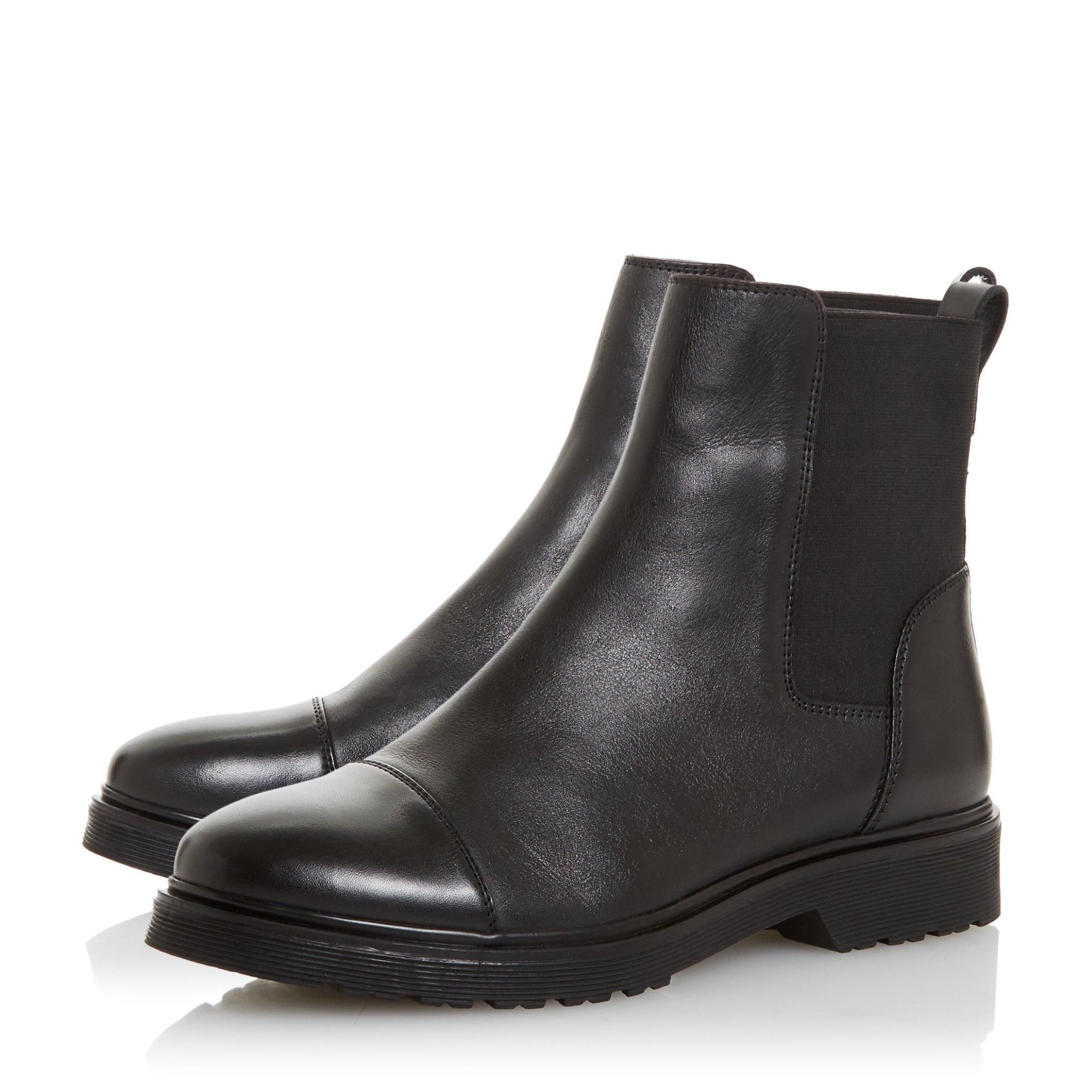 The Paysan Chelsea boot from Dune London exudes timeless appeal. Featuring elasticated inserts, pull-up tabs and a low block heel. This pull-on design is finished with a classic round toe and cleated sole.