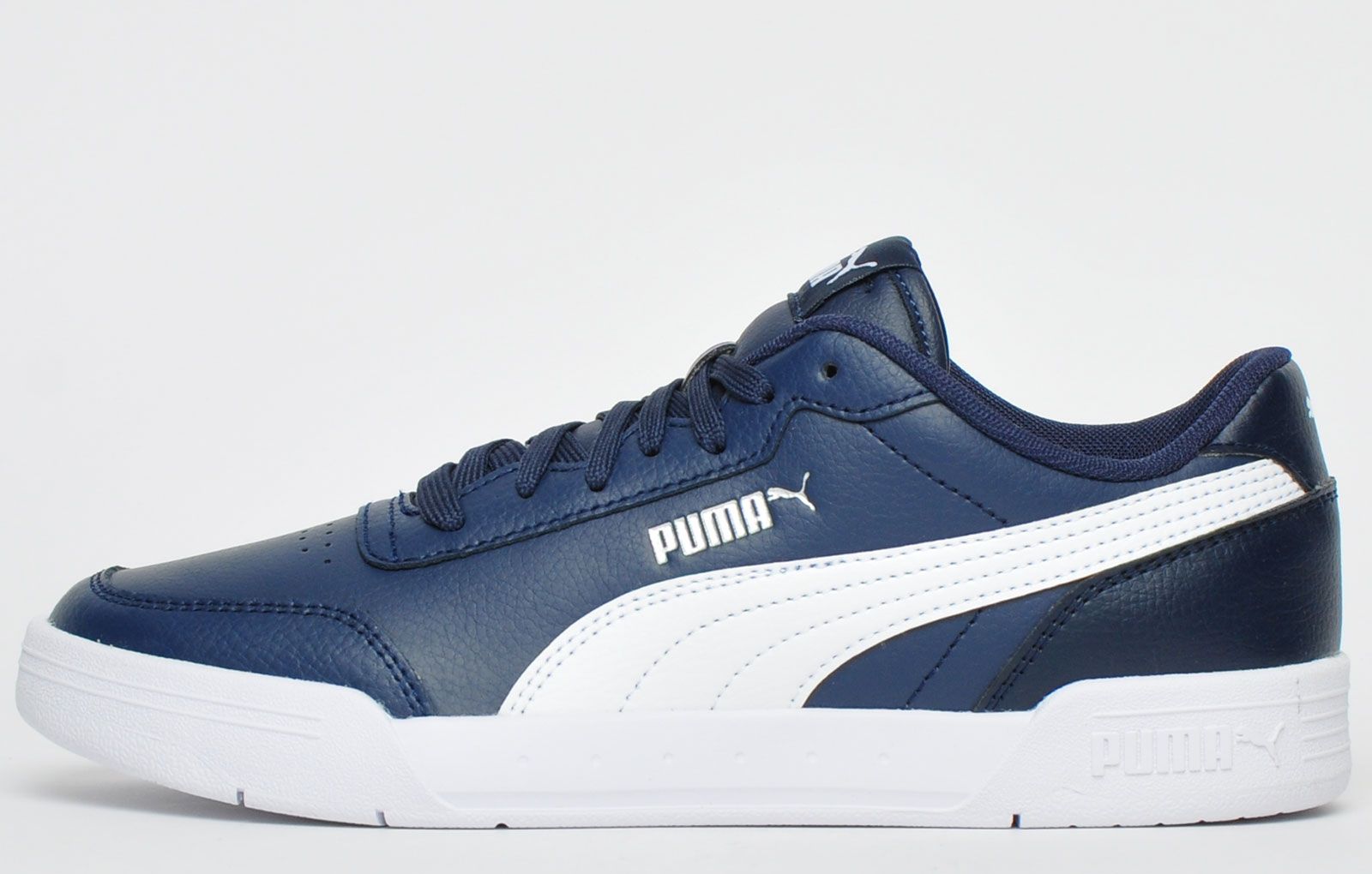 <p>The Puma Caracal is another classic from Puma’s court heritage constructed with a tennis inspired silhouette featuring a premium leather upper paired with a durable cupsole for a timeless look</p> <p>SoftFoam+ Puma’s comfort sockliner delivers long-lasting comfort that provides soft cushioning with every step you take.</p> <p>- Leather upper</p> <p> - Classic lace up system</p> <p>- SoftFoam+ comfort sockliner</p> <p>- Padded tongue and heel</p> <p>- Durable grippy outsole</p> <p>- Puma branding throughout</p>