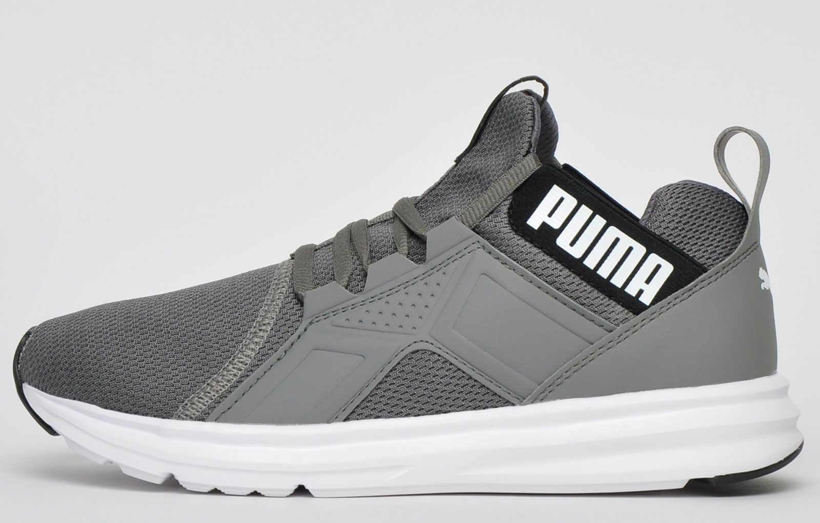 <p>The Puma Enzo was designed as a lightweight workout shoe featuring a breathable mesh upper with an exaggerated tongue and collar to provide ankle support and style.</p> <p>Featuring a synthetic material that works as an external heel counter holding the foot steady during aggressive exercise with an EVA foam midsole keeping the foot comfortable and protected by absorbing the shock.</p> <p>A SoftFoam sock liner provides soft, plush cushioning under the foot whilst the durable outsole with flex grooves delivers additional durability and traction</p> <p>- Textile mesh synthetic mixupper</p> <p>- External heel counter for heel lockdown</p> <p>- Integrated lacing system </p> <p>- SoftFoam sock liner</p> <p>- EVA foam midsole for shock absorption</p> <p>- Midfoot strap for additional support and lock down fit</p> <p>- Padded heel collar with heel tab</p> <p>- Heel loop for easy on off wear</p> <p>- Puma branding throughout</p>