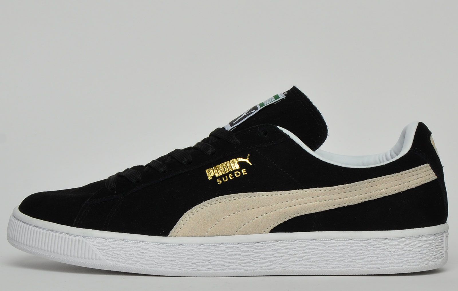 <p>The famous Puma Suede originally started its life as a basketball shoe in the 60s before receiving its hero cult status it now has due to trainer enthusiasts around the world falling for its amazing looks and great street appeal. A very stylish trainer sitting at the forefront of retro trainer appeal of the modern day. Inspired with that old school charm in mind, straight from the court this is an updated classic that will never go out of fashion and which takes, comfort, durability, and styling to the next level. This Puma Suede has an unmissable charm and creates the perfect trainer for individuals who want retro style and luxurious comfort all combined into one. Crafted in a premium suede leather with a Puma form stripe this is the epitome of a super cool trainer at an affordable price. Puma signature branding appears to the side upper and a full Puma Cat logo is also visible to the tongue. These suede’s have a padded heel and ankle arch for a comfortable fit and feature a contrasting textured midsole well suited to the rigors of an active lifestyle. </p> <p>- Premium suede leather upper</p> <p> - Secure lace up system </p> <p>- vintage styled wrap around sole</p> <p>- Additional cushioning and added ankle support</p> <p>- Durable outsole with treaded design for added grip</p> <p>- Puma branding throughout </p>