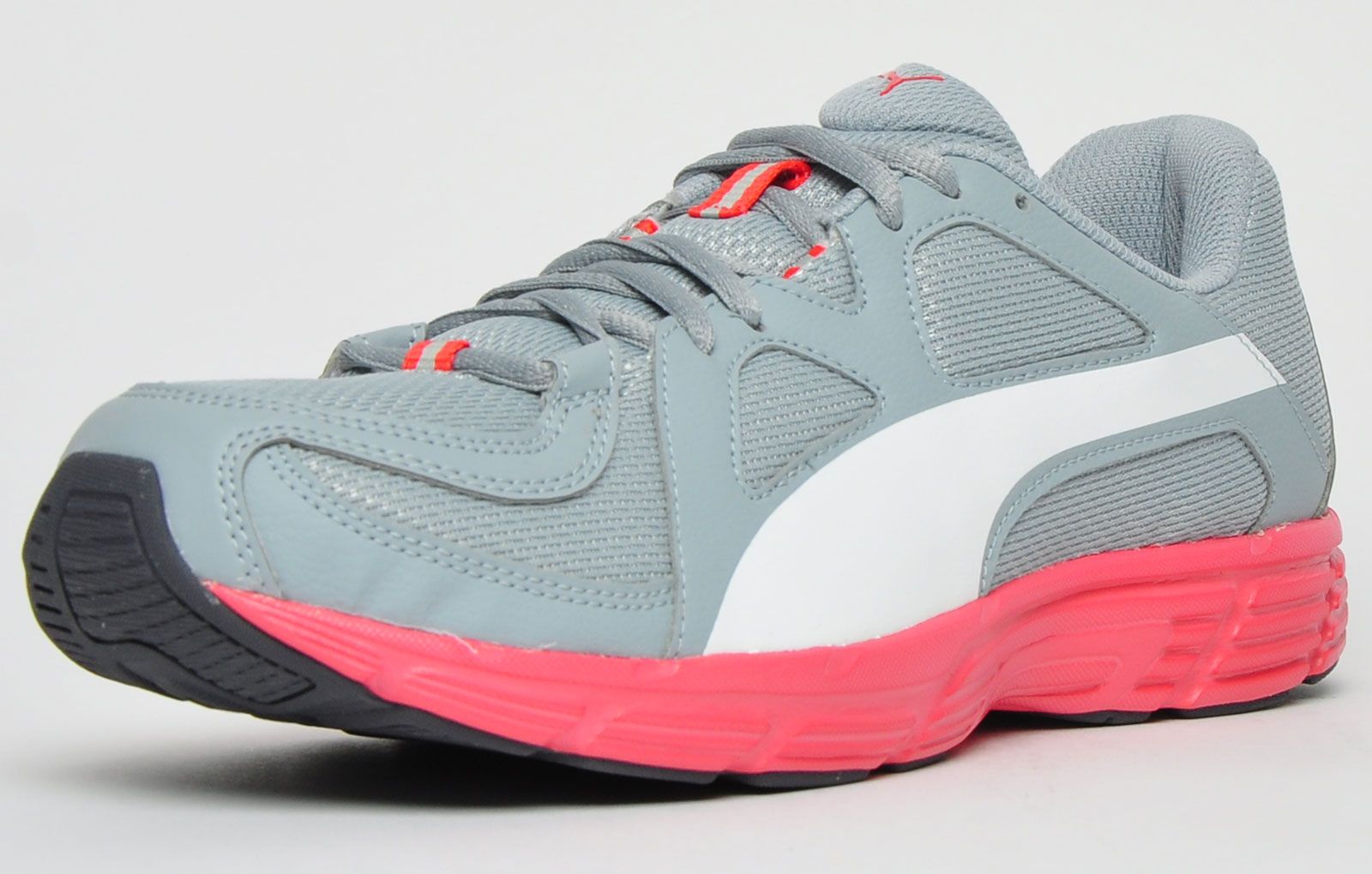 This versatile running shoe from Puma, the Axis is ideal if you’re looking for a shoe that will not only pound the tracks and streets but will do a great job in the gym also. The Axis won’t let you down on looks either, with its clean-cut silhouette and striking colourway this is definitely one to pick up at this amazingly low price. <p>The Puma Axis is constructed from a soft breathable textile/mesh upper and benefits from an Ortholite Sockliner for extra cushioning, and moisture management and an Archtec midsole support system to increase stability while running or in the gym. The Axis is nicely finished off with tasteful Puma branding to the tongue, upper and heel, combining this with a durable outsole and a shoe that is very light in weight for its category your definitely onto a sure winner at this price.</p> <p>- Lightweight textile/mesh upper </p> <p>- Soft padded ankle and heel </p> <p>- Secure up front lace up closure </p> <p>- Durable rubber outsole offers traction </p> <p>- Heel support for added stability</p> <p>- Puma branding throughout</p>