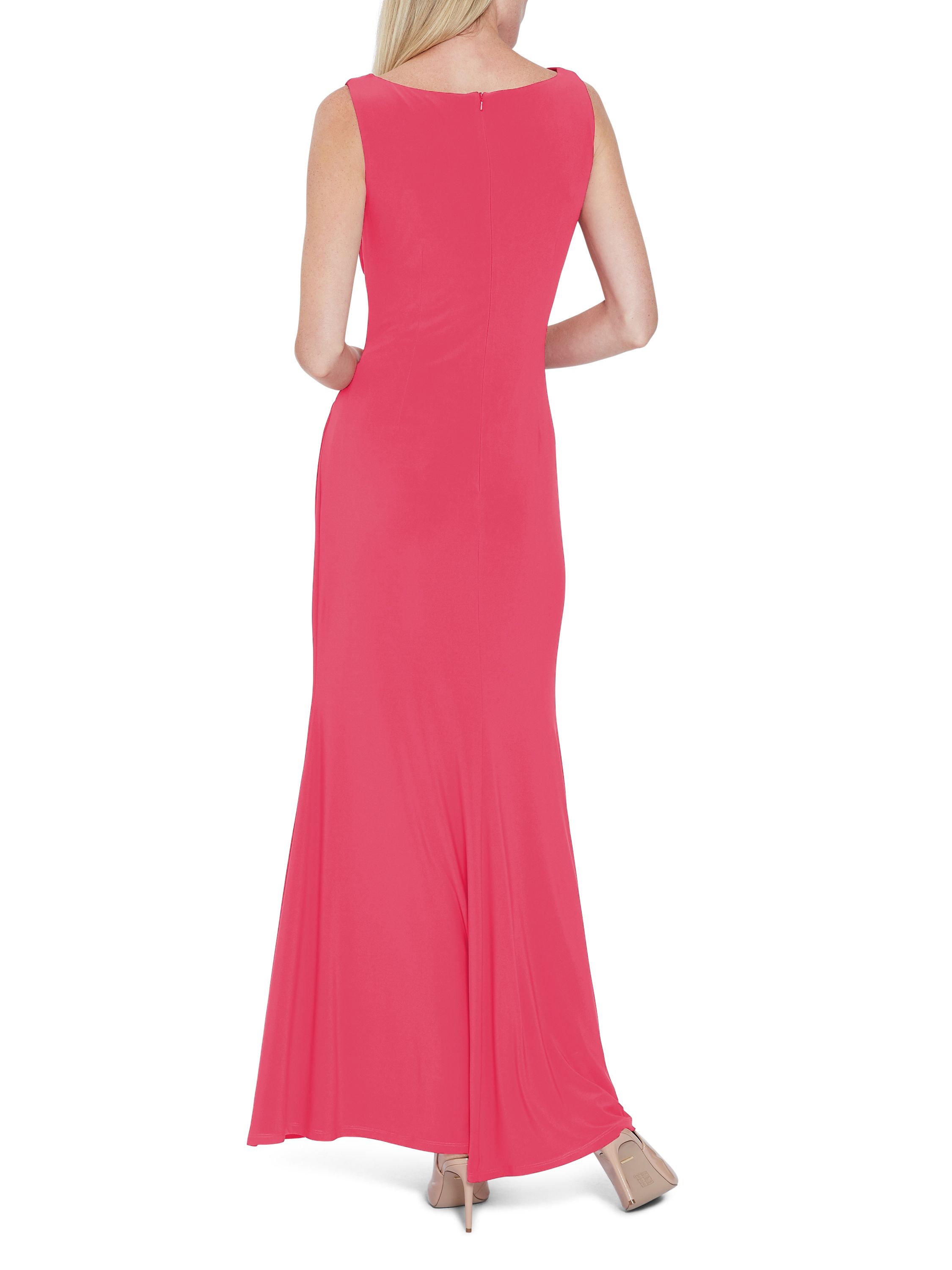 This maxi dress by Gina Bacconi is a showstopper of a piece. This piece is fashioned from a luxuriously soft jersey fabric which gracefully wraps over the bodice and ruches at the side of the waist. The asymmetric drape of the dress offers you a flawless silhouette. This dress is fully lined for extra comfort and fastens using a concealed centre back zip.