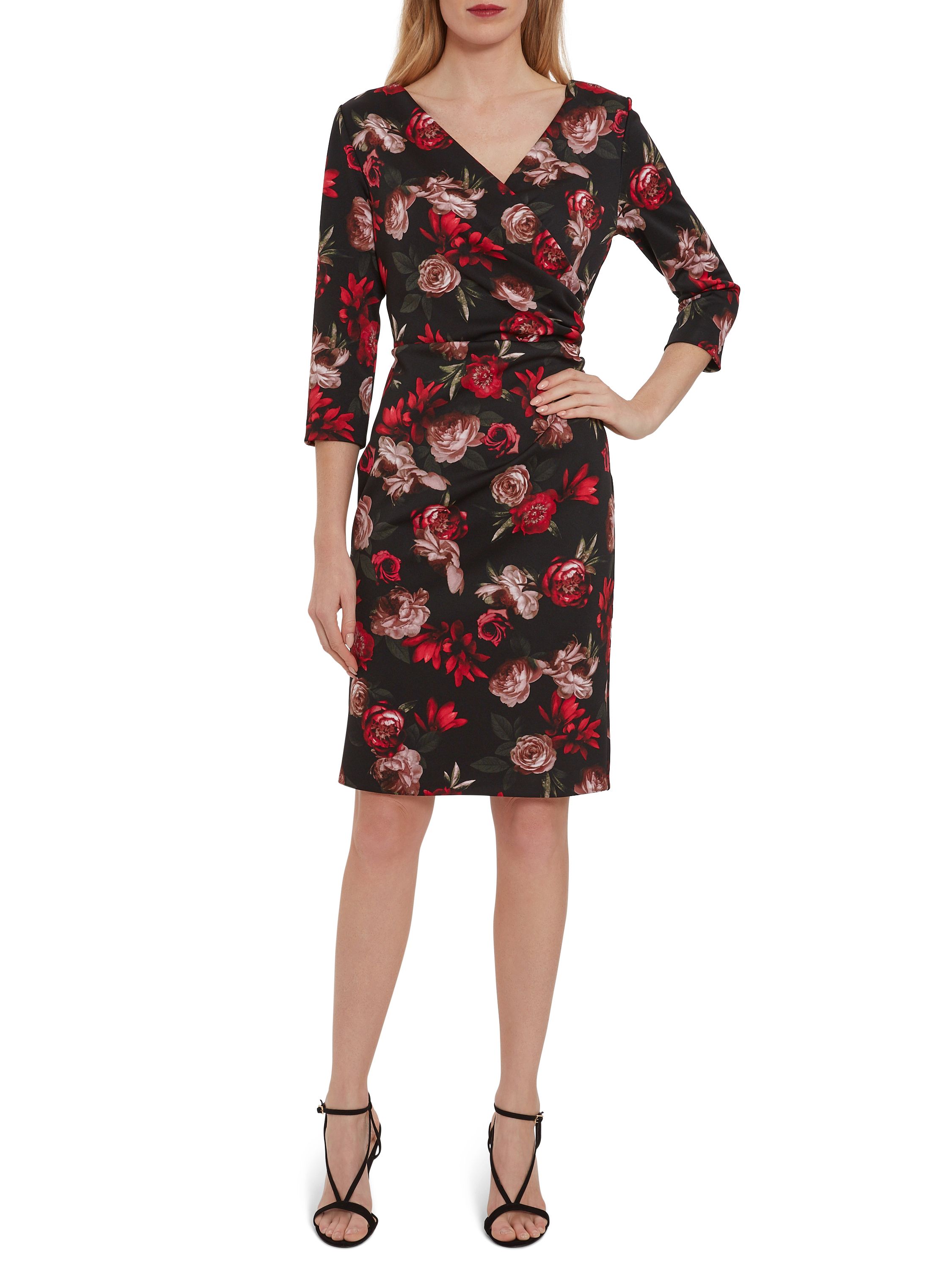 This Gina Bacconi dress will make a fabulous addition to your wardrobe. Perfect as a daywear option, the dress is fashioned from a lovely floral print scuba making it effortless to wear. The dress features a wrap style bodice for added class with elegant draping to side giving you perfect silhouette. Fully lined for comfort.